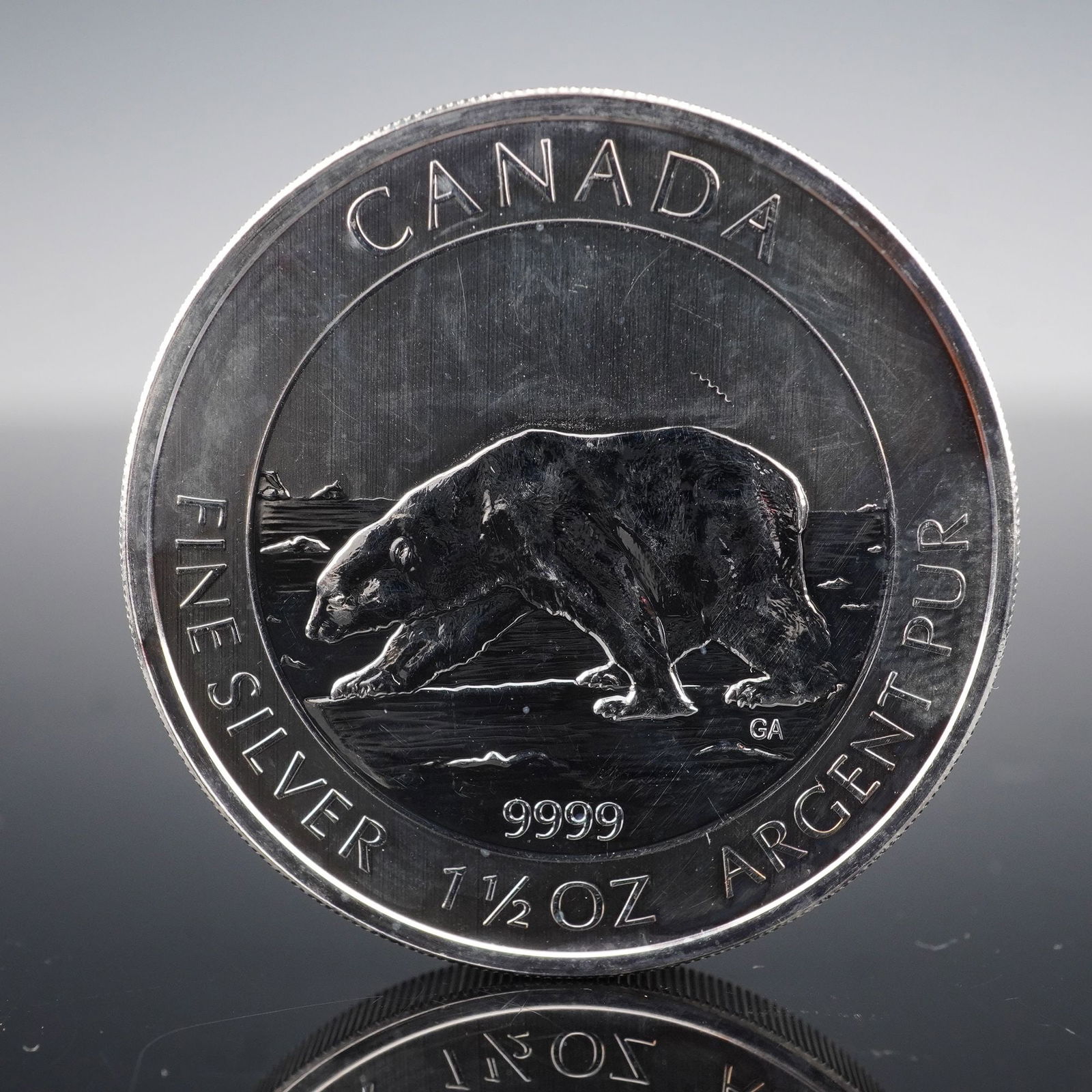 2013 Canadian Elizabeth II Silver Eight Dollars Coin: Composed of .9999 fine silver with a weight of 1.5 oz. The obverse side features a right-facing portrait of Queen Elizabeth II at 77 years of age, depicted bareheaded and adorned with a necklace and e