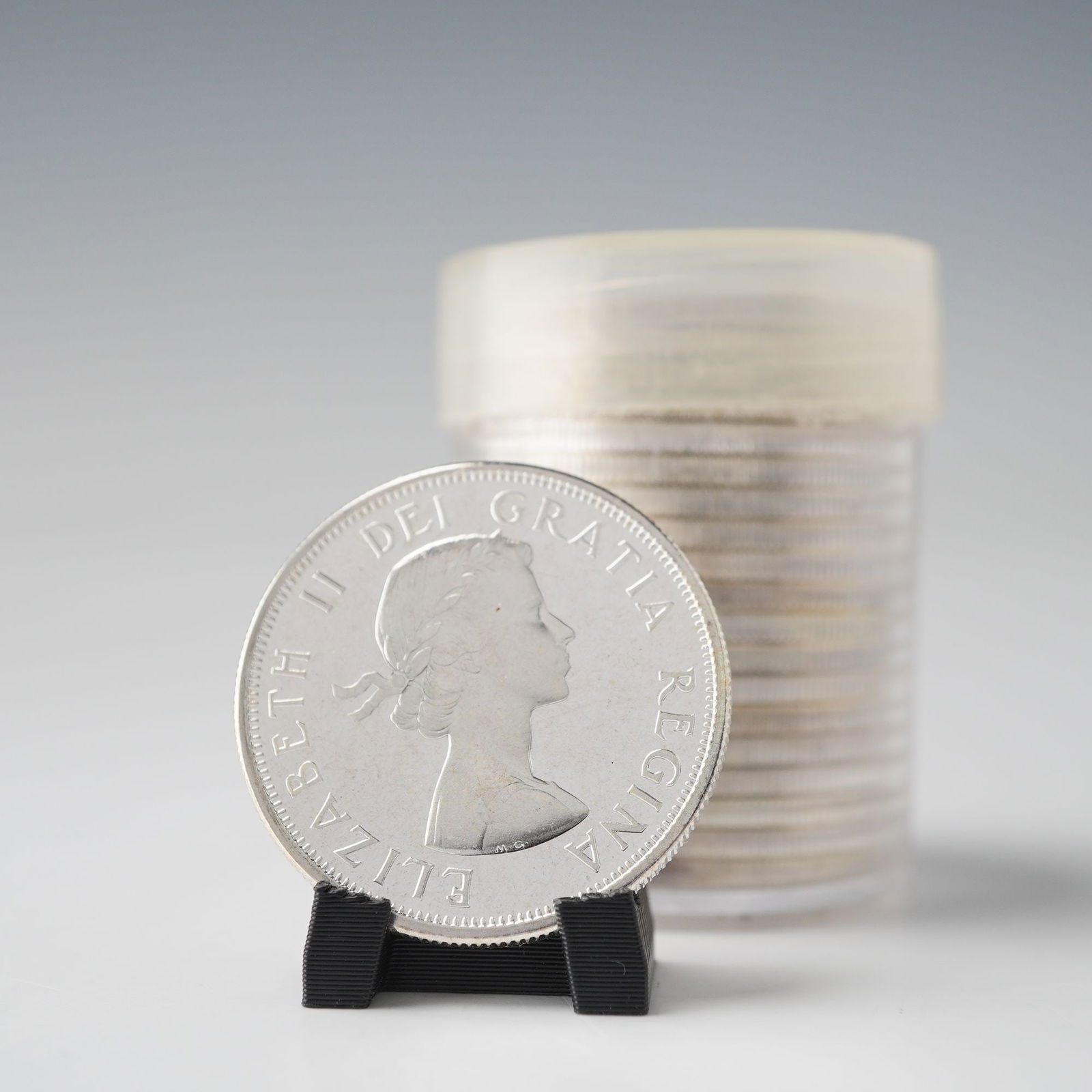 20pc 1964 Canada Elizabeth II 50 Cent Silver Coins: All dated 1964 and fabricated from a significant .800 fine silver alloy. The obverse features the youthful, laureate first effigy of Queen Elizabeth II, designed by Mary Gillick, surrounded by the Lat