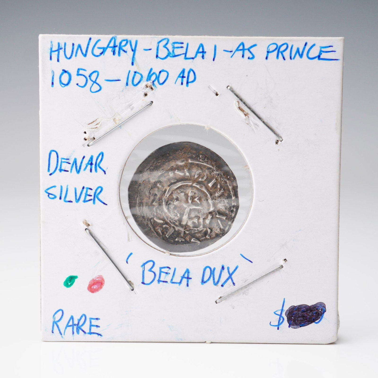 1058 - 1060 Early Medieval Bela I as Prince Denar Coin Hungary: This Early Medieval denar coin dates to the period when Bela I ruled as Prince of Hungary from 1058 to 1060. The obverse features an isosceles cross within a pearl ring, with wedges placed between eac