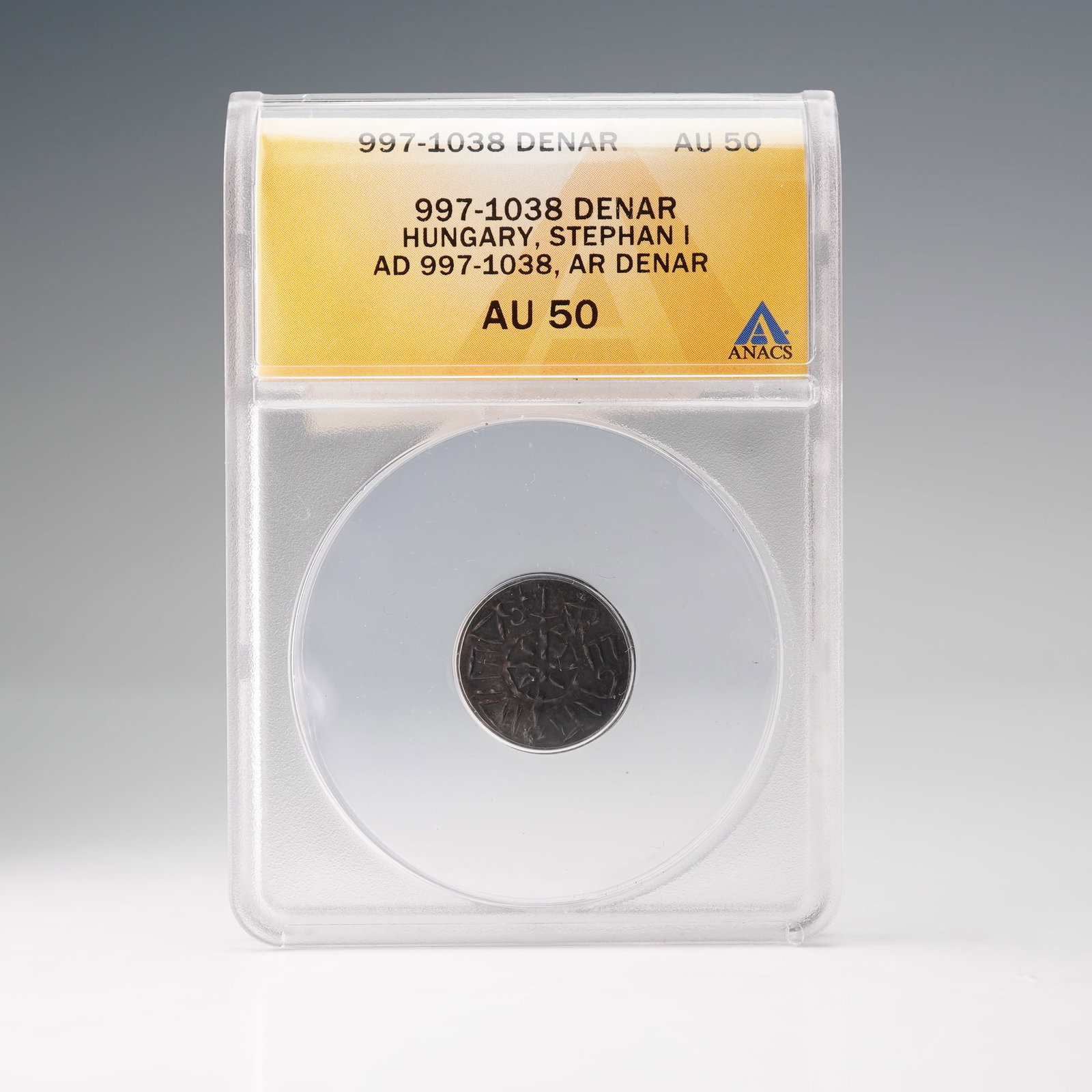Antique Hungarian Stephen I Denar ANACS AU-50: Silver denar coin issued during the reign of Stephen I of Hungary between AD 997 and 1038. Struck in silver (AR) at an early medieval Hungarian mint, this piece represents one of the earliest coinages