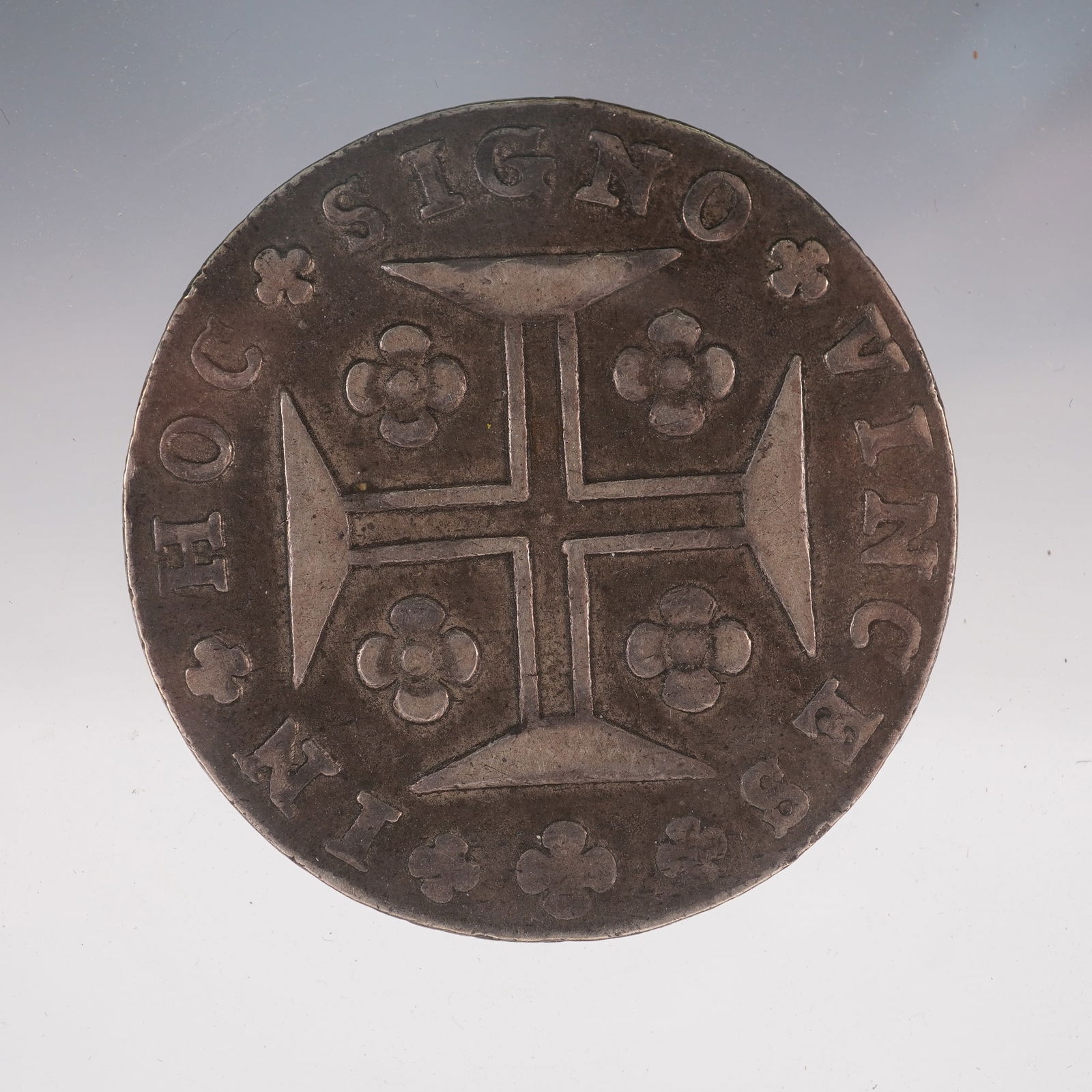 1815 Portuguese Cruzado Novo Joao Prince Regent Coin: A silver coin issued under Joao, Prince Regent, struck in .9167 fine silver. The obverse displays the blazon of the Kingdom of Portugal surmounted by a royal crown, with the 400 marked to the left and