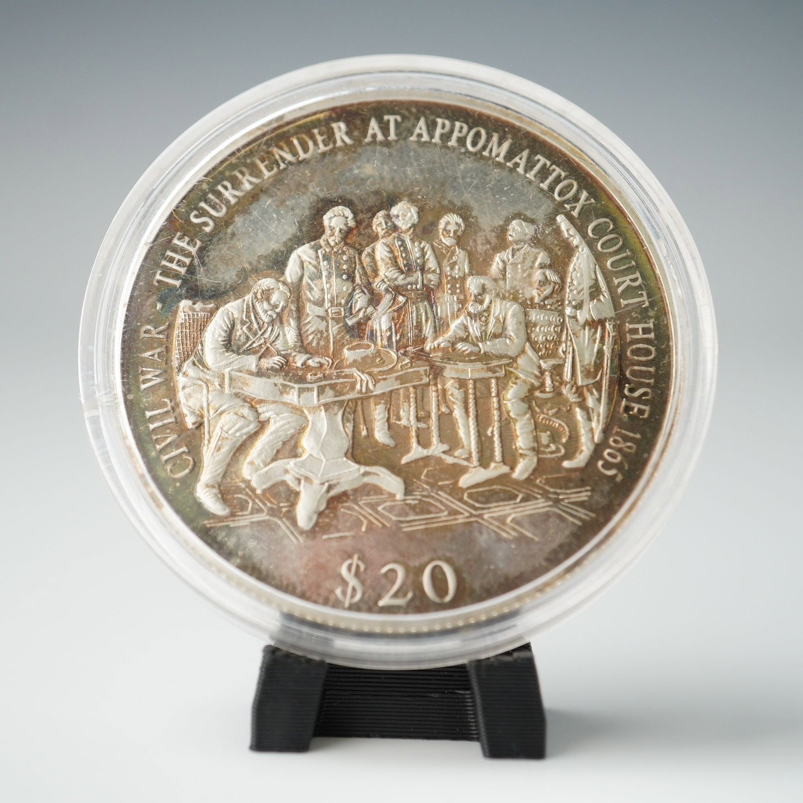 2000 Liberia 20 Dollar Coin Surrender at Appomattox Court House: This commemorative coin from Liberia marks the historic Surrender at Appomattox Court House in 1865, a key event in the American Civil War. The obverse displays the country's coat of arms, with the in