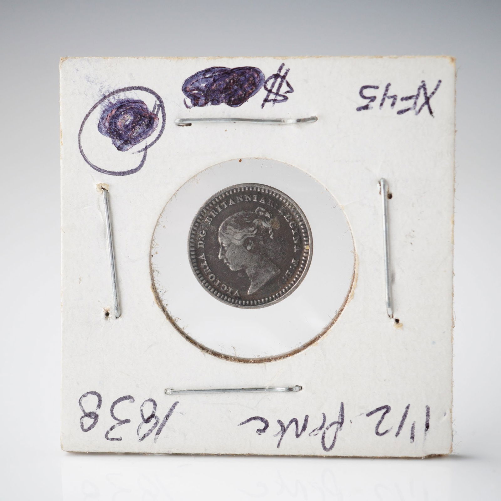 1838 United Kingdom Silver 1 1/2 Pence, XF45: Queen Victoria silver 1 1/2 pence (three-halfpence) dated 1838. Obverse with young-head bust and legend VICTORIA DEI GRATIA BRITANNIAR. REGINA FID. DEF.; reverse with crowned 1 1/2 within wreath and d