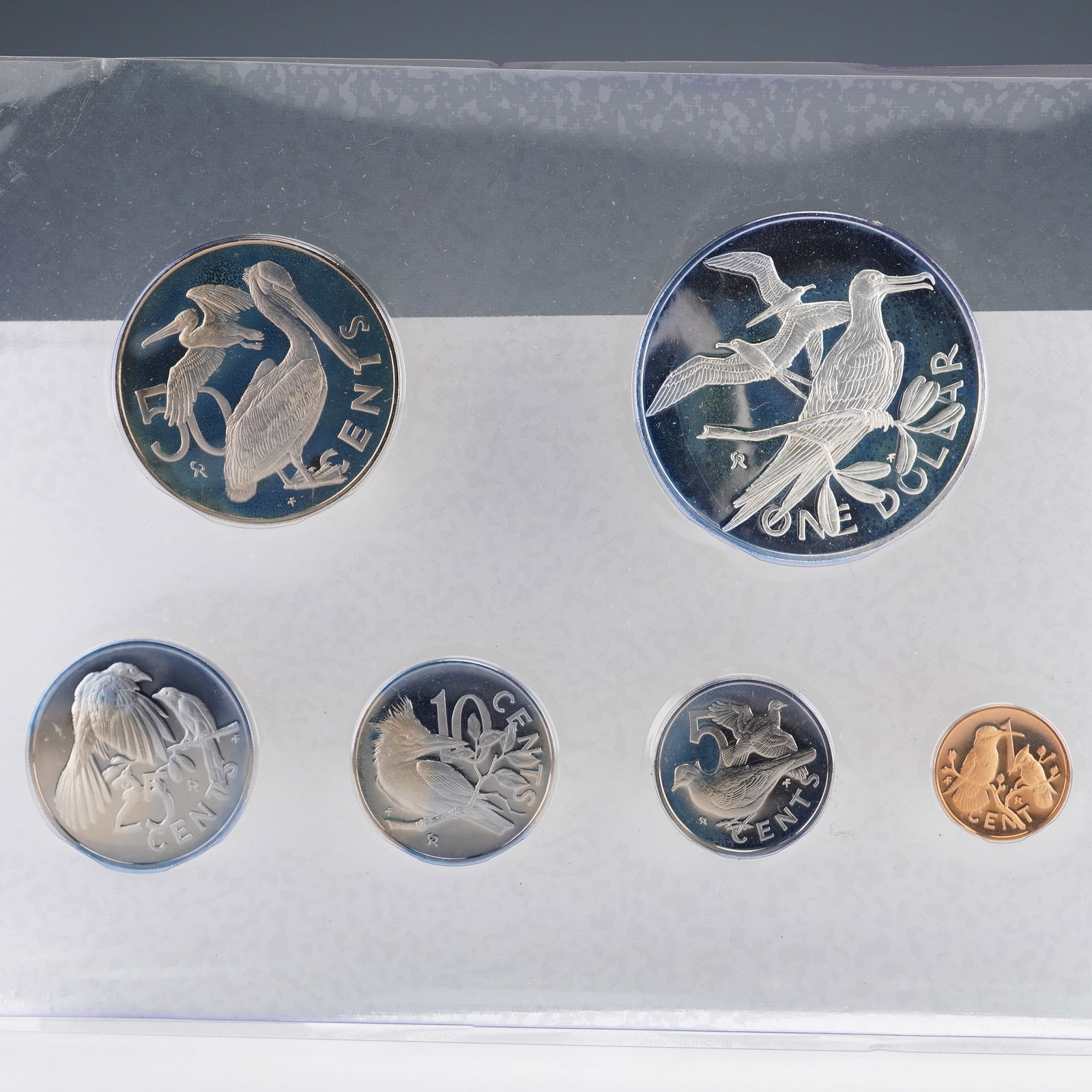 BVI 1973 First Coinage 6-Coin Proof Set, QE II: A collection of six coins comprising the First Official Coinage Proof Set of the British Virgin Islands, dated 1973. The set was minted by The Franklin Mint, as confirmed by the accompanying Certifica