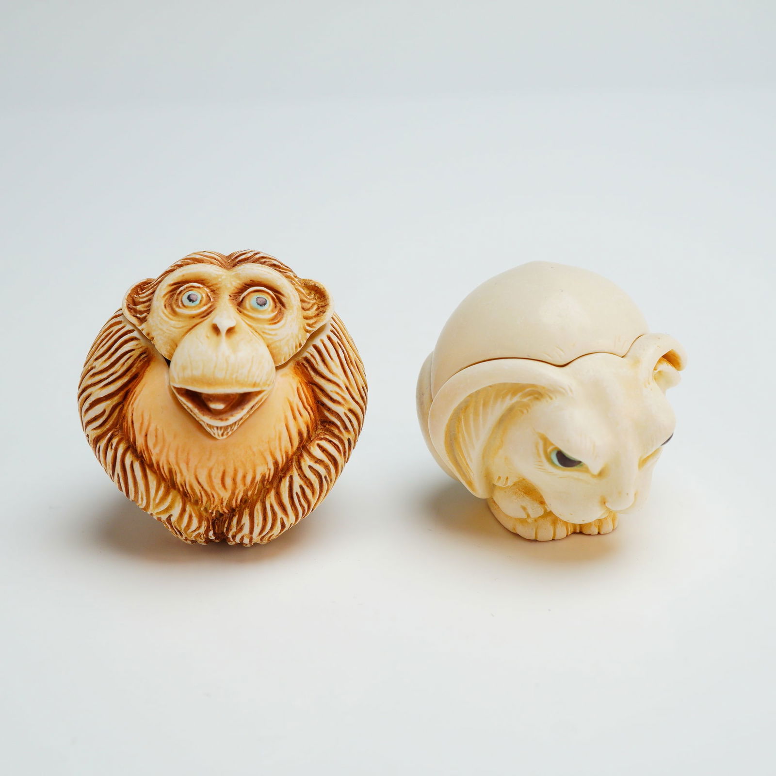 2pc Harmony Kingdom Roly Poly Box Figurines, Fergie & Dizzie: A pair of Harmony Kingdom Roly Poly collection trinket boxes, including the monkey figure known as Dizzie, carved animal figurines are executed in a style reminiscent of Japanese netsuke. The monkey f