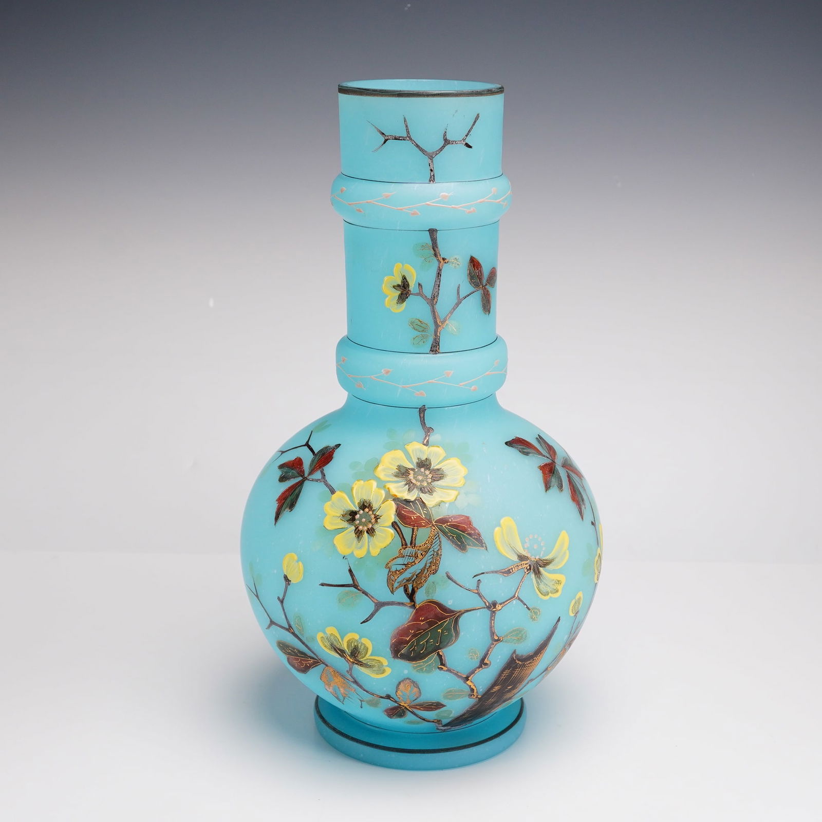 Antique Victorian Blue Satin Art Glass Vase: This late 19th-century Victorian art glass vase, attributed to Thomas Webb and Sons, is crafted from blown opaque turquoise-blue satin glass with a frosted finish. The vessel features a bulbous body a