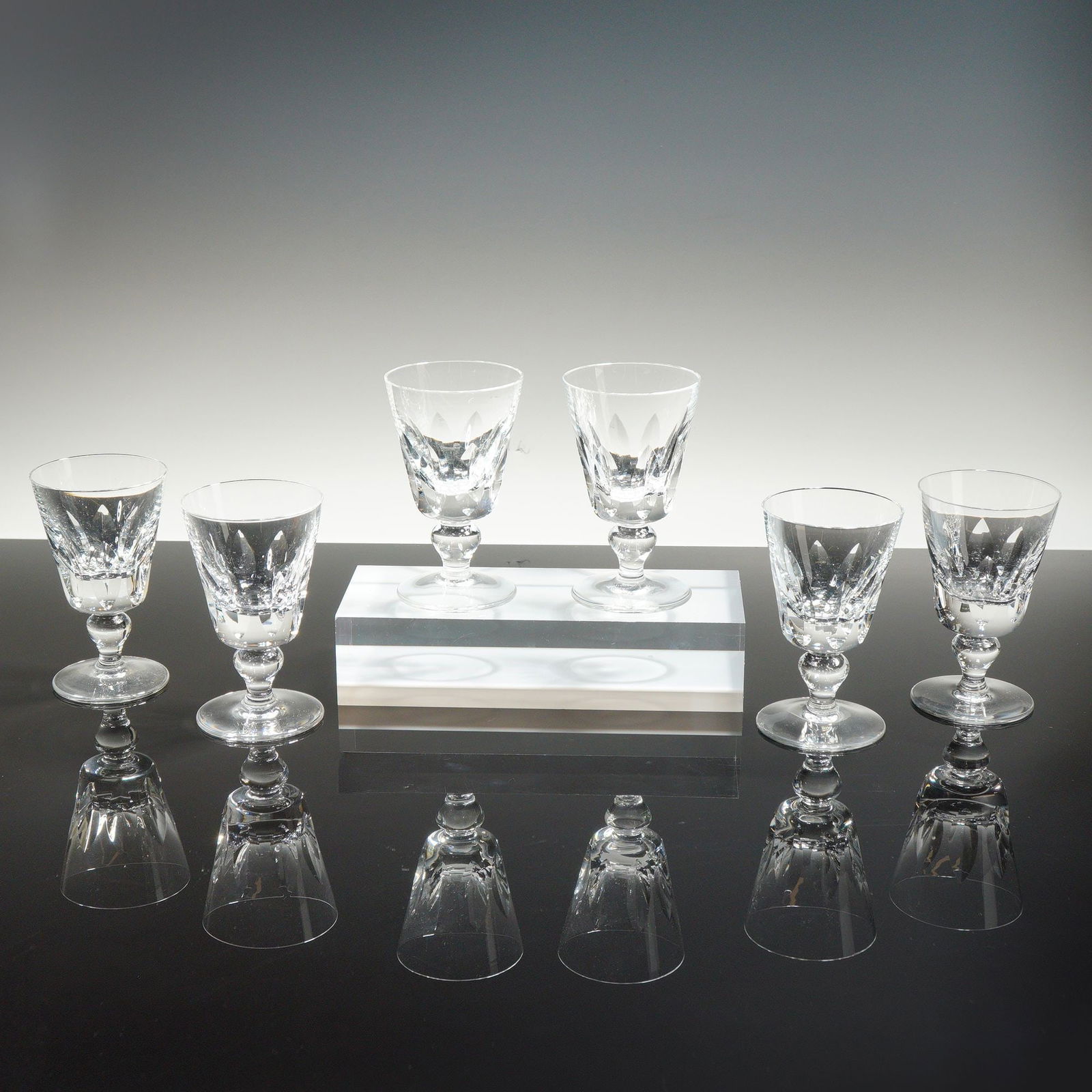Set of Six Saint-Louis Liqueur Glasses, Jersey: This set of six cordial or liqueur glasses was produced by the renowned French crystal manufacturer Saint-Louis in the Jersey pattern. Crafted from high-quality full lead crystal, these pieces exhibit