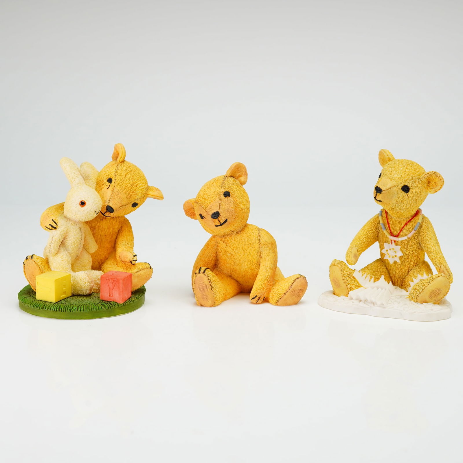 Three Royal Doulton Jane Hissey's Old Bear and Friends Figurines: These items are manufactured from a textured resin material designed to replicate the appearance of plush fabric, including simulated seams and stitching. The group consists of Don't Worry, Rabbit (OB