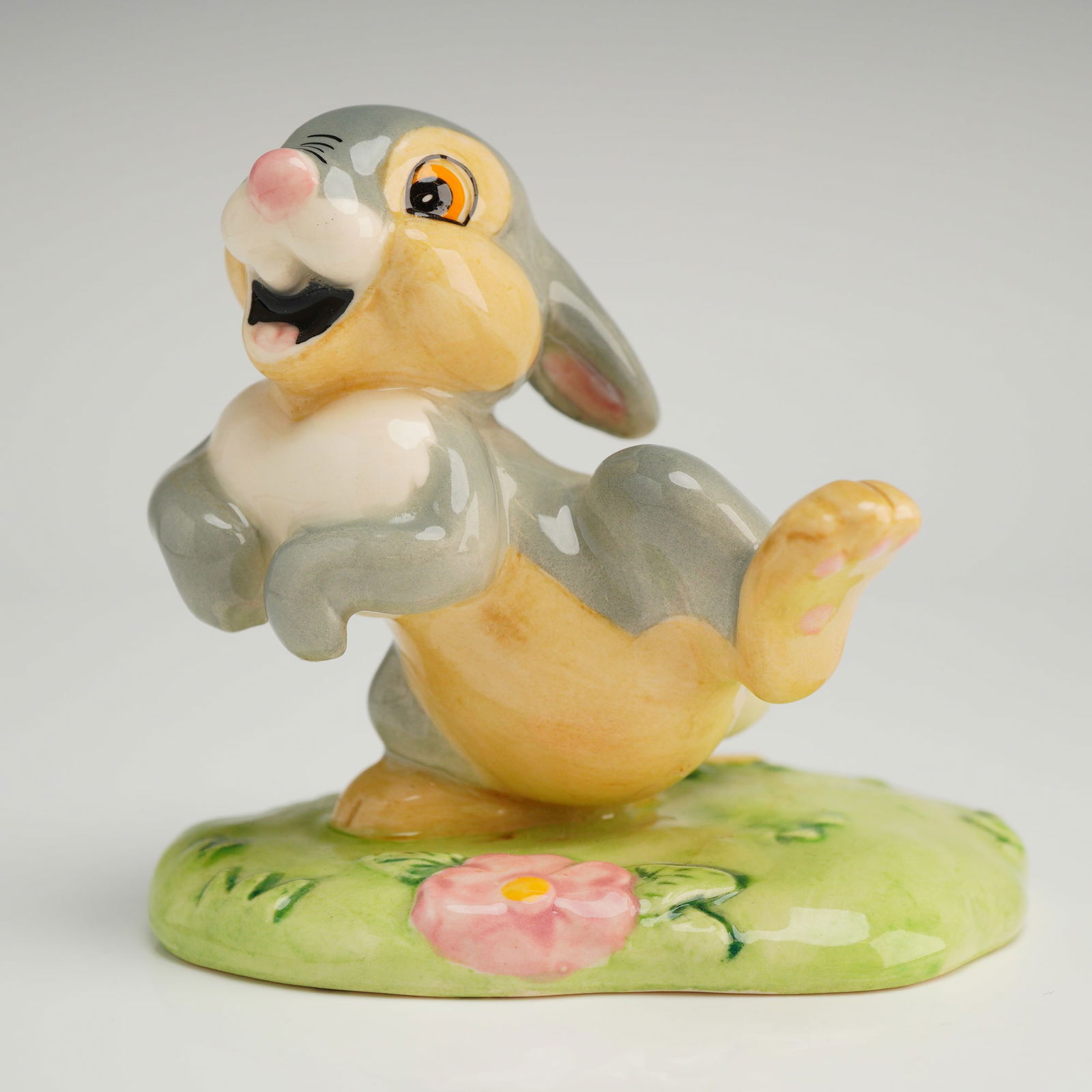 Royal Doulton Film Classics Walt Disney's Thumper Figurine FC 2: A glazed ceramic figurine from the Royal Doulton Film Classics Collection, part of the Disney Showcase Collection, titled "Walt Disney's Thumper." The figure depicts the rabbit character Thumper from