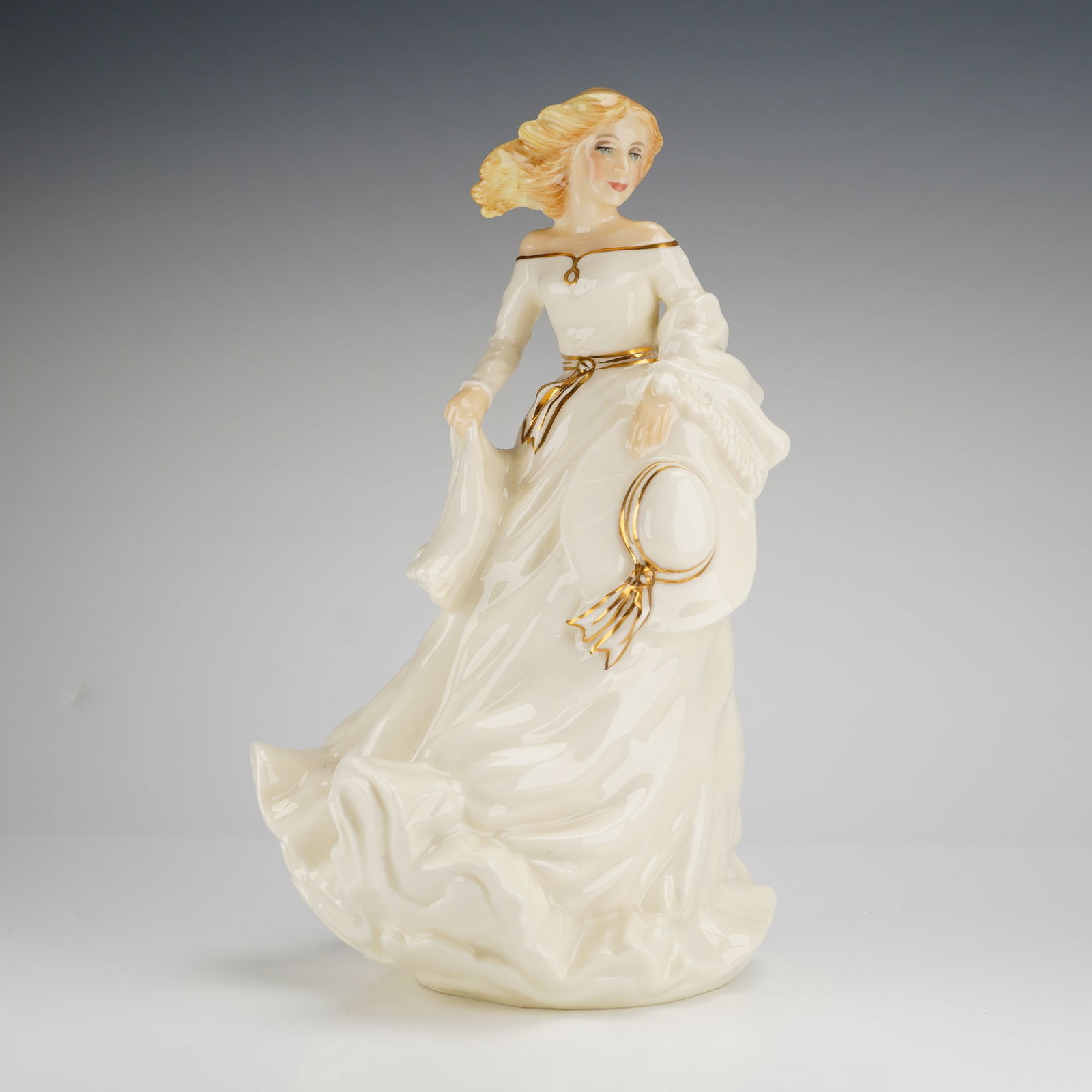 Royal Doulton Summer Breeze HN3724 Porcelain Figurine: A single Royal Doulton Figurine, Summer Breeze HN3724, crafted from cream/ivory porcelain with gold accents, marked on the base with the Royal Doulton backstamp and dated 1995. Dimensions: 4.50"L x 4.
