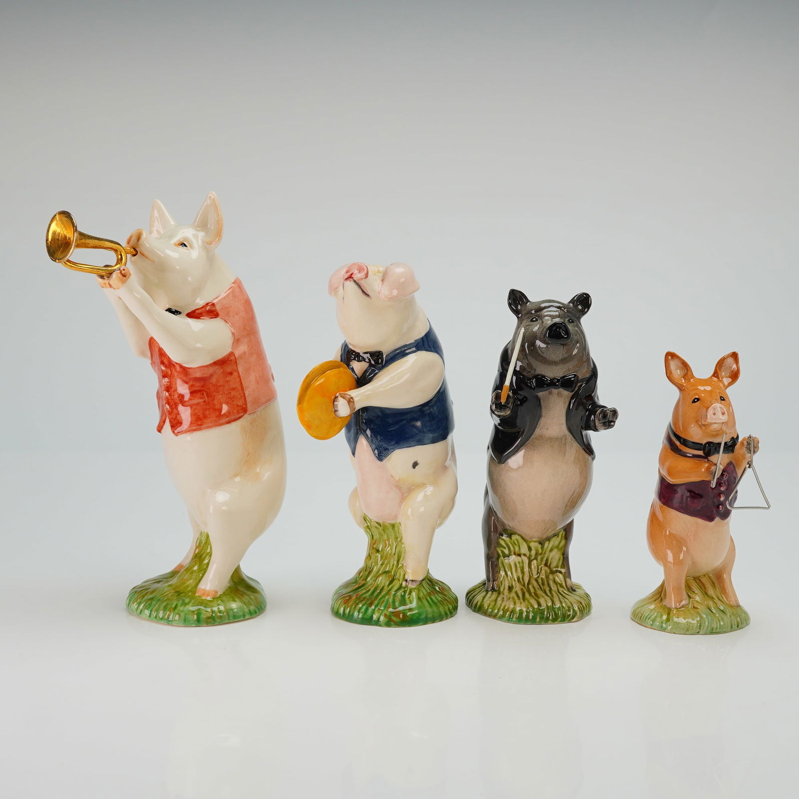 Set of 4 Beswick Pig Promenade Figurines PP1, PP2, PP4, and PP7: Pig Promenade band series figurines crafted in glazed ceramic with hand-painted details. This 4pc collection features anthropomorphic pigs in formal and semi-formal attire, including waistcoats and bo