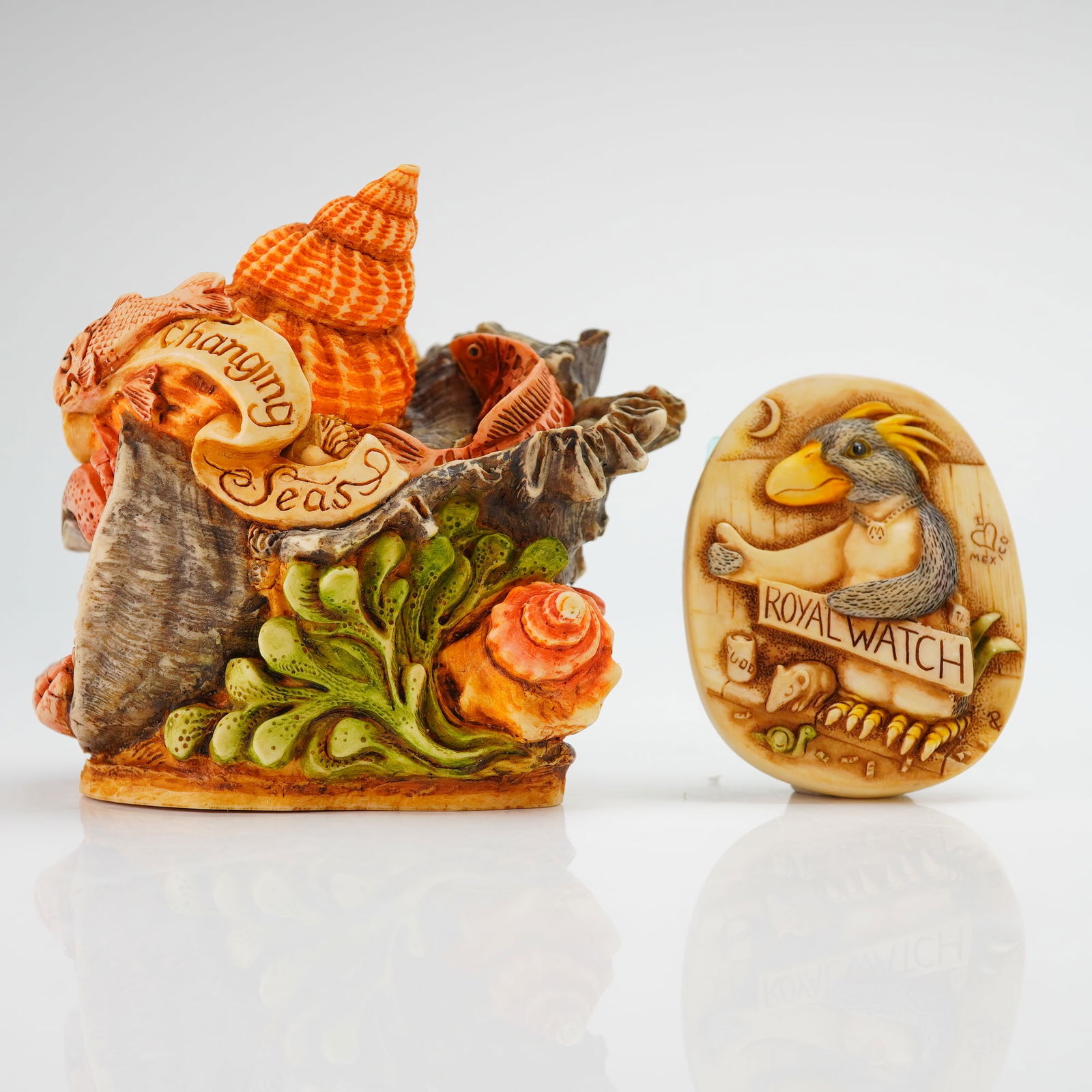 Harmony Kingdom 1999 Royal Watch Club Kit: This Harmony Kingdom 1999 Royal Watch Club Kit consists of a sculpted resin trinket box and a coordinating oval pin. The trinket box, titled Beneath the Ever Changing Seas, features a multi-colored ex