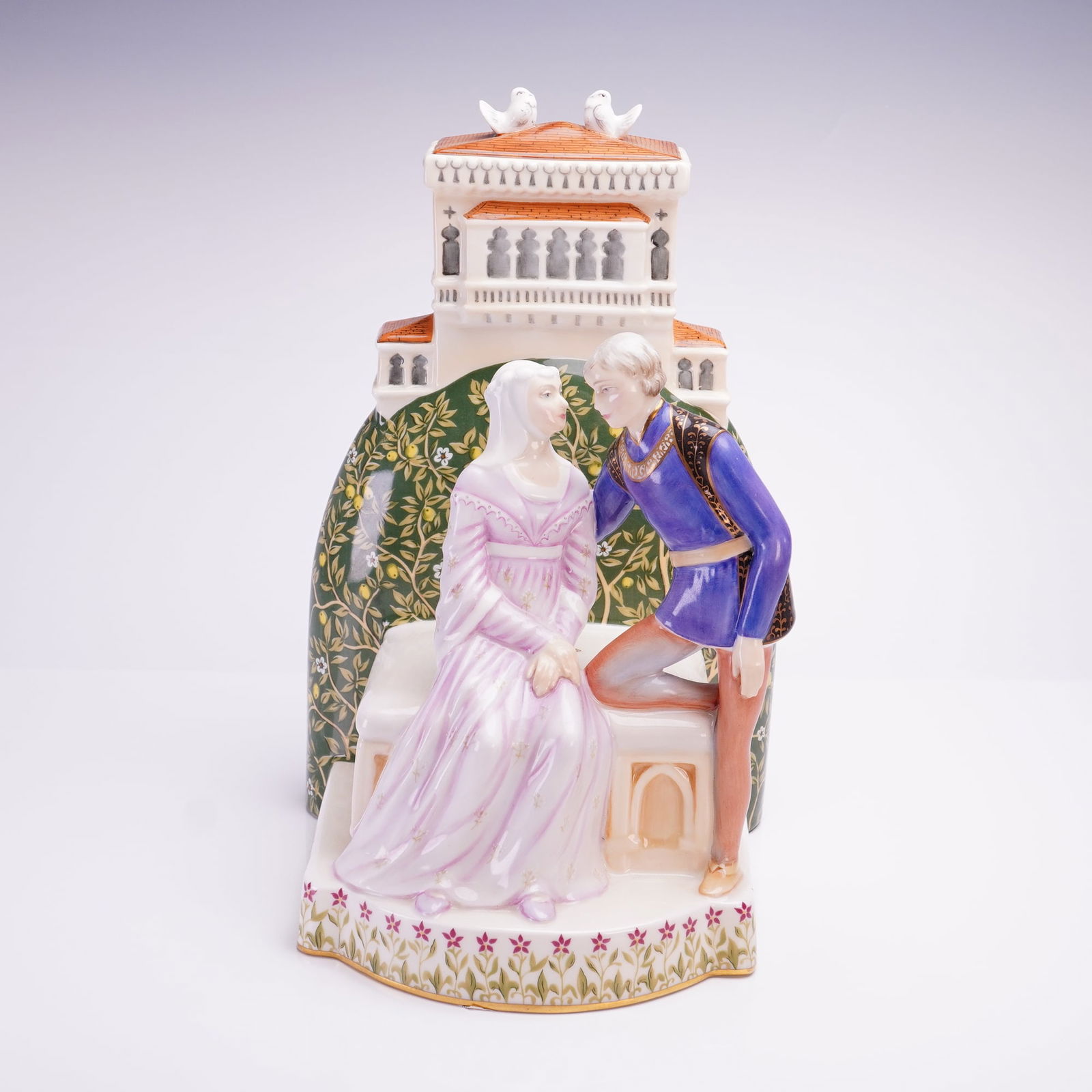 Royal Doulton Great Lovers Figurine, Romeo and Juliet HN3113: From the Great Lovers series, this limited edition (1 of 150) tableau was modeled by Robert Jefferson. The polychrome-painted scene features two figures in the foreground; Juliet is depicted in a