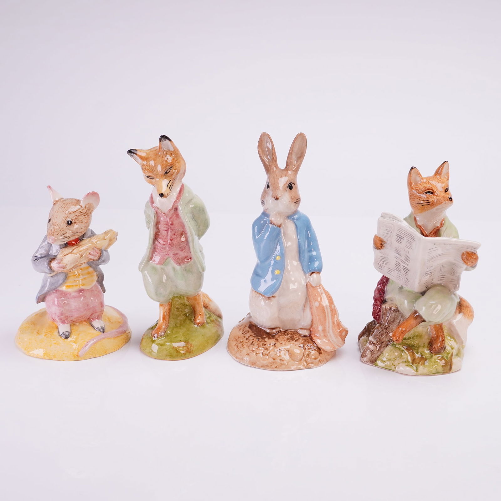 Collection of Four Royal Albert and Beswick Potter Figurines (1 of 3)
