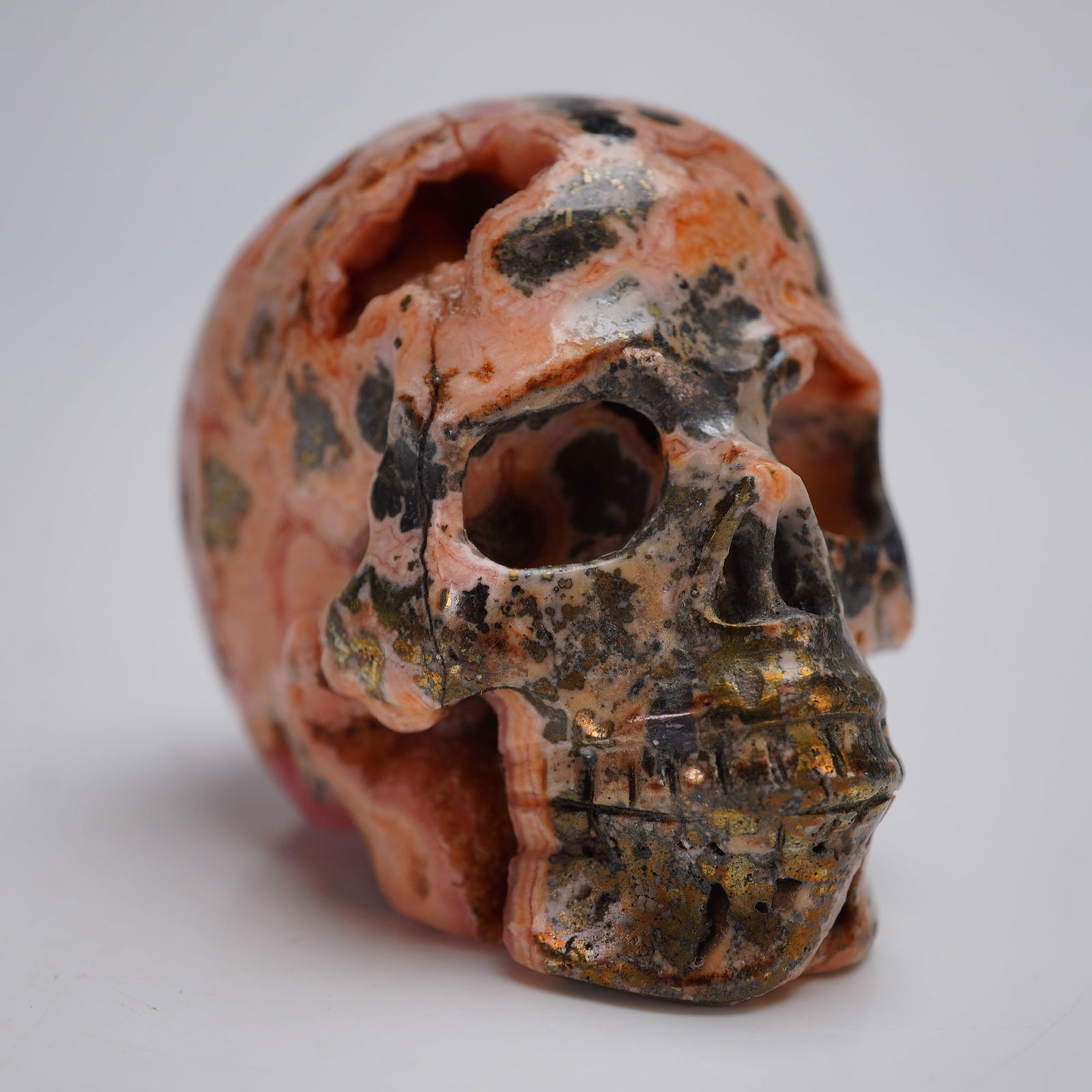 Pink and Black Rhodonite Hand Carved Crystal Skull (1 of 4)