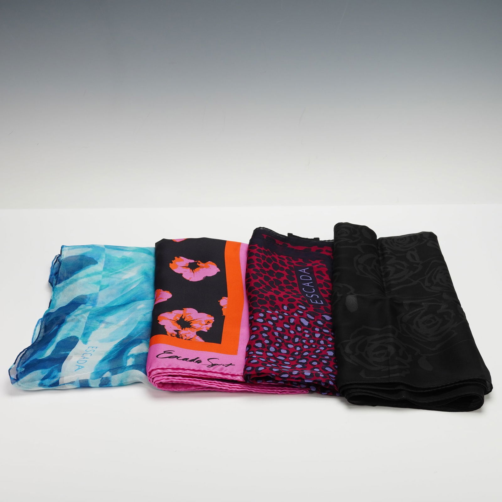 A Group of Four Escada Silk Scarves, Various Designs (1 of 4)