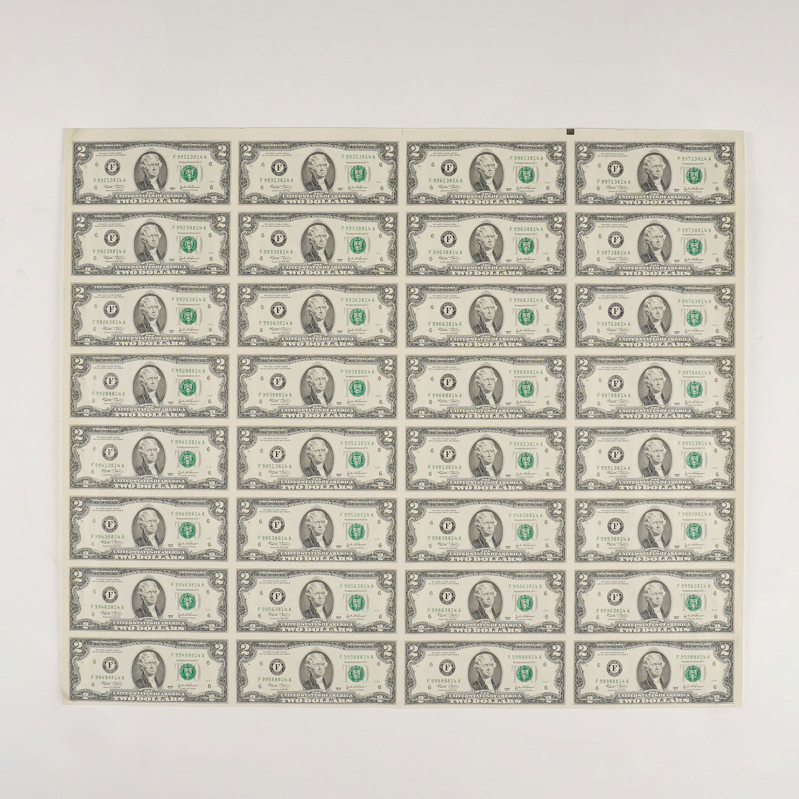 USA Uncut United States 2 Dollars 2003 Jefferson Complete Sheet of 32 Note: A complete uncut sheet of thirty-two United States two-dollar Federal Reserve Notes, Series 2003. The notes are issued from the Federal Reserve Bank of Atlanta, Georgia. The obverse of each note featu