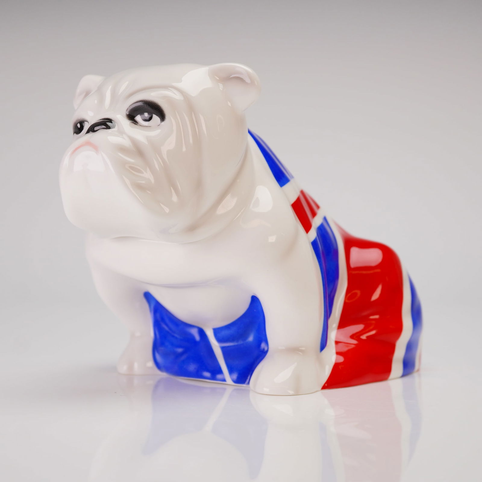 Royal Doulton James Bond Skyfall Jack the Bulldog DD 007 Figurine: A highly sought-after collectible ceramic figurine, the Royal Doulton Skyfall Jack the Bulldog DD 007, released in 2012 to commemorate the 50th Anniversary of the James Bond film franchise and its app