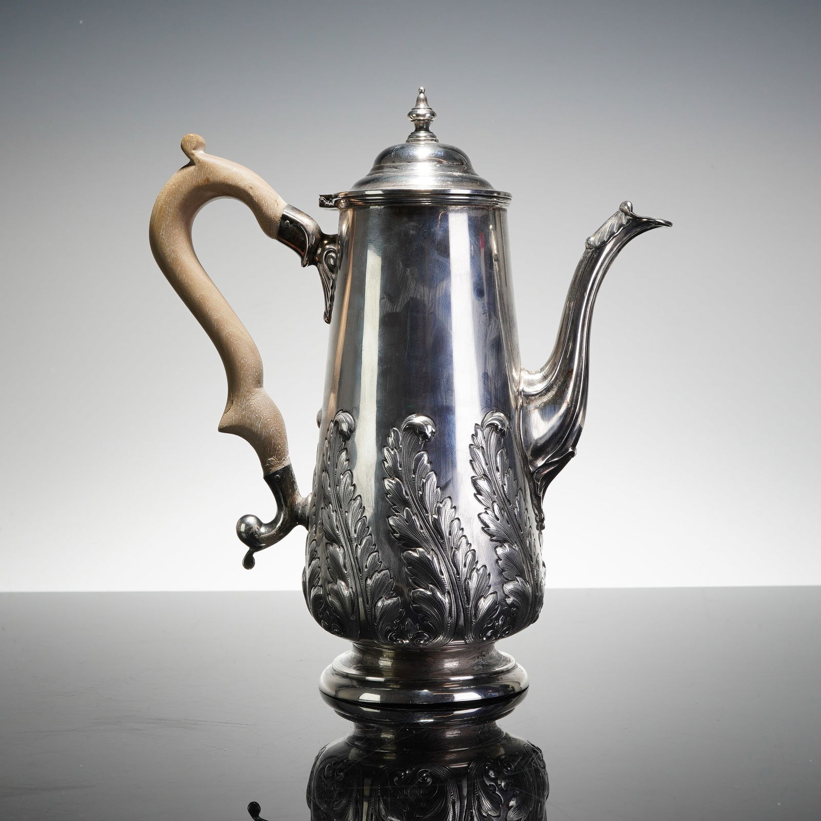 Hamilton & Inches Edinburgh Sterling Silver Coffee Pot: This sterling silver coffee pot was produced by Hamilton & Inches of Edinburgh. It features a tapered cylindrical body supported by a stepped, spreading circular foot. The lower portion of the body is