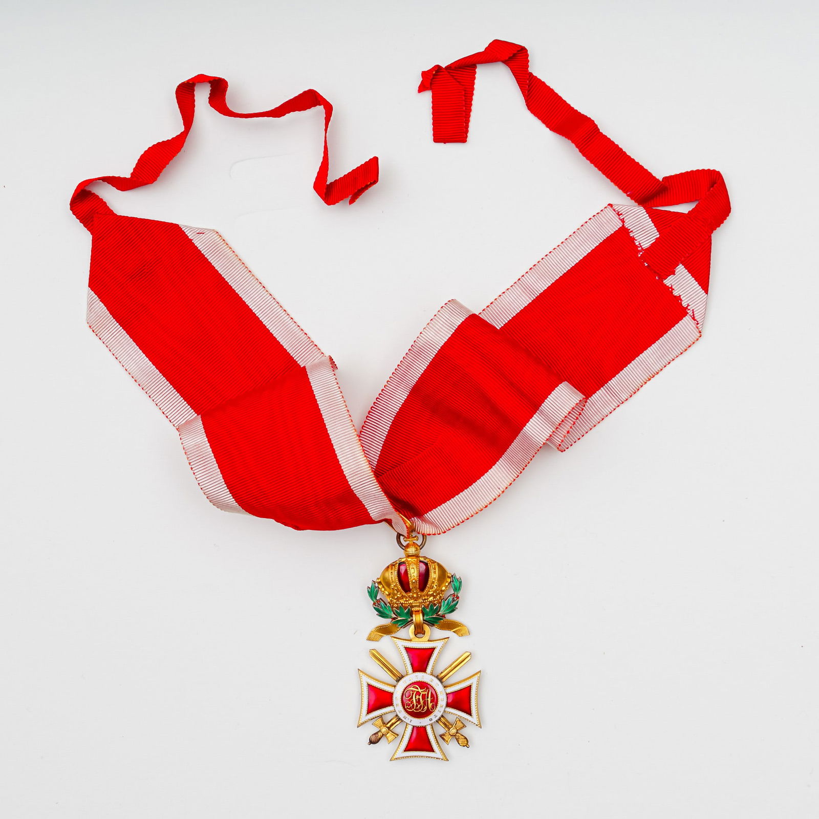 Austrian Order of Leopold Badge Grand Cross with Swords: An exceptional example of the Austrian Imperial Order of Leopold, Grand Cross with Swords, circa 1808-1900. This distinguished order features a finely enameled red and white Maltese cross suspended