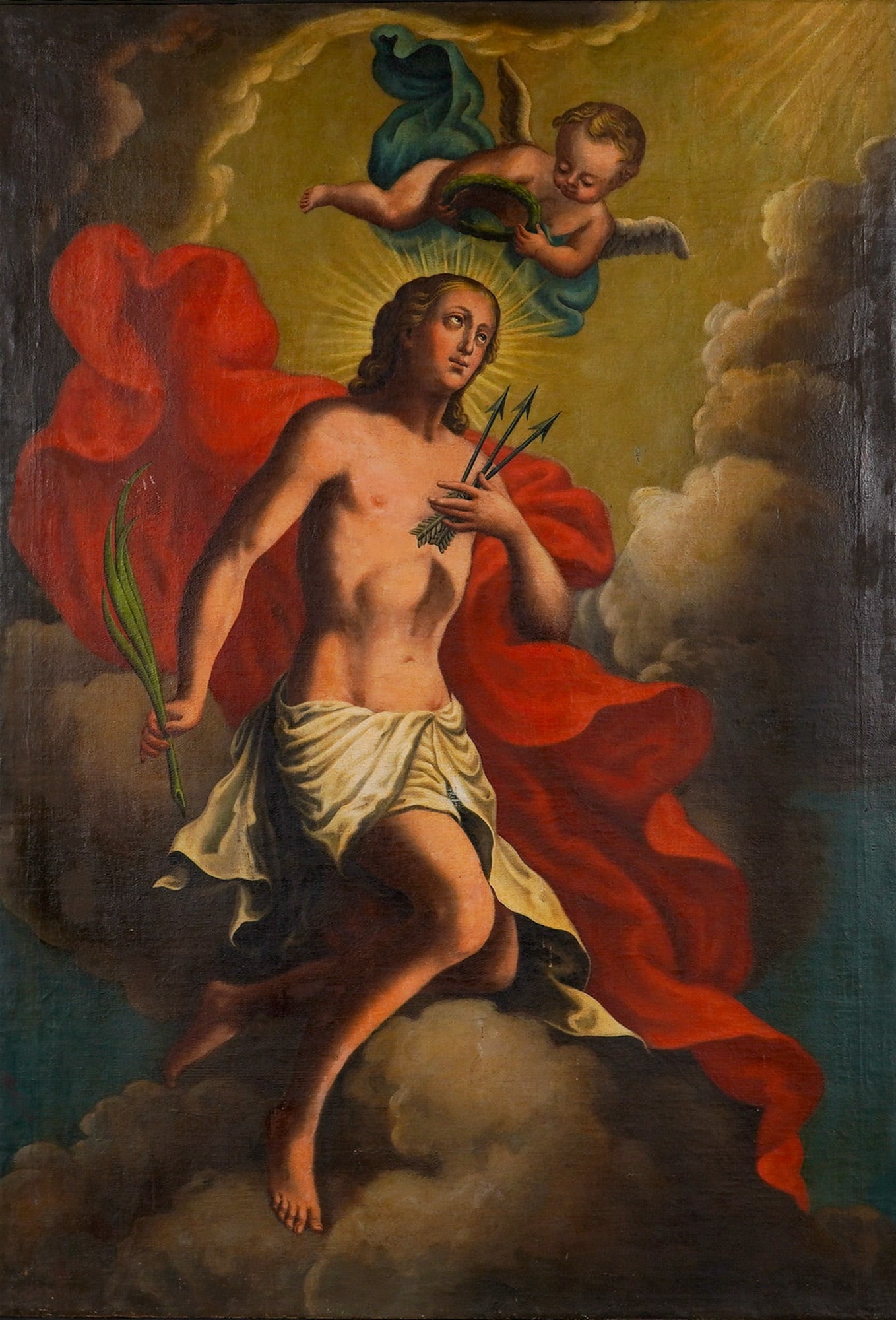 Large Original Oil on Canvas, Saint Sebastian w/ Cherub: This oil on canvas depicts Saint Sebastian, shown as a youthful martyr seated upon clouds and accompanied by a cherub holding a green laurel wreath. The saint holds a palm frond and arrows, traditiona