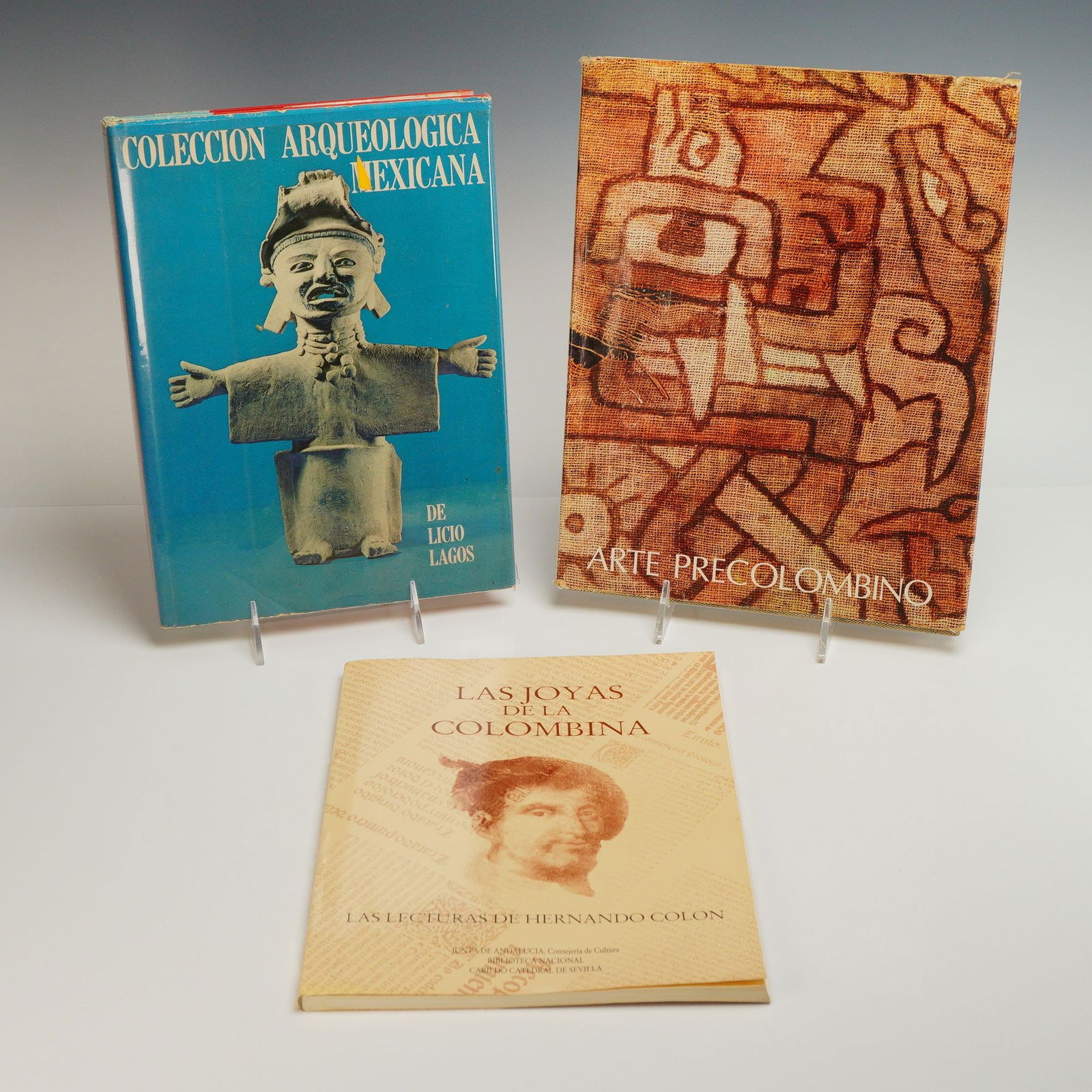 3 Pre-Columbian & Spanish Art History Books: A trio of 20th-century publications focusing on Mexican archaeology, pre-Columbian art, and historical Spanish manuscripts. The collection includes Coleccion Arqueologica Mexicana by Licio Lagos, feat