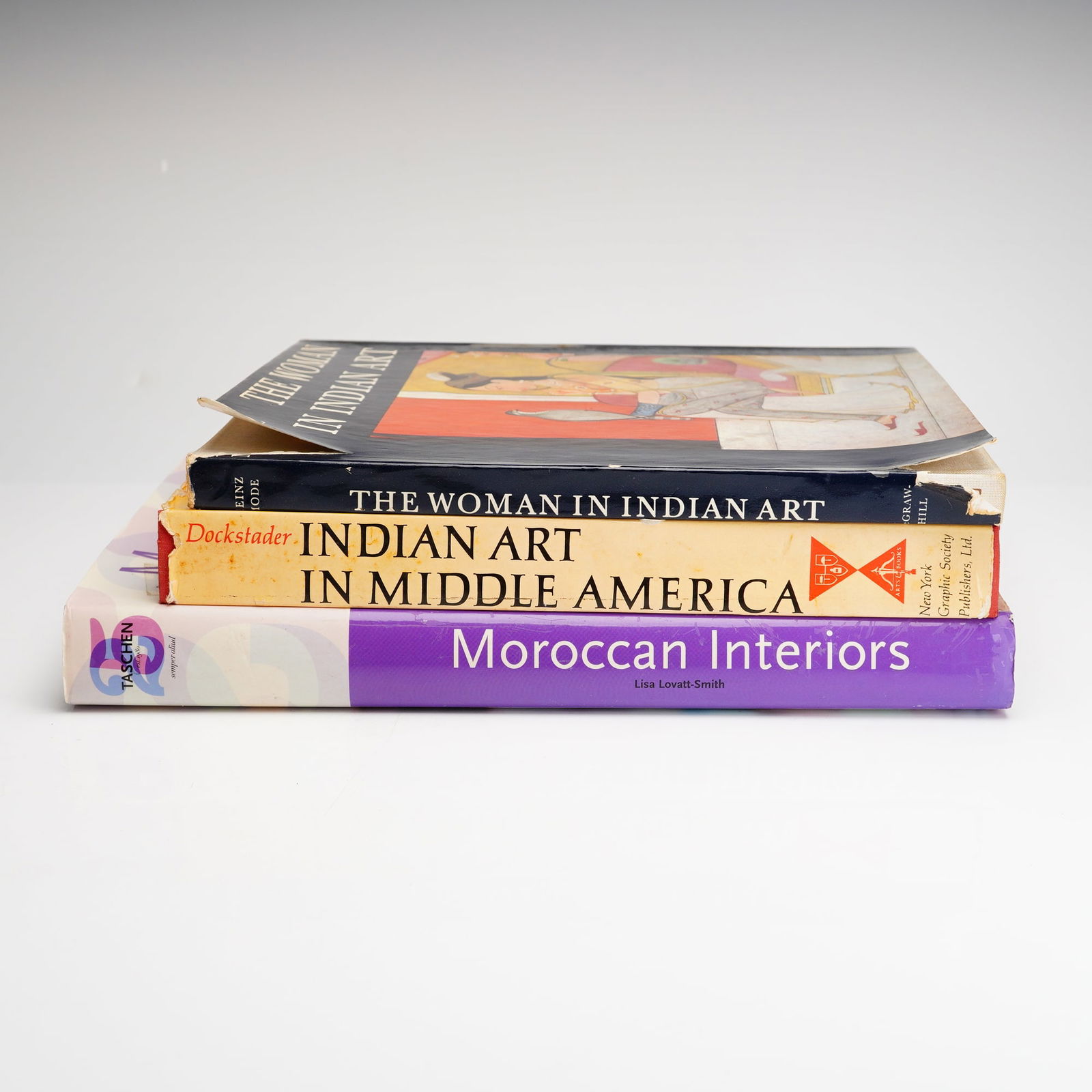 3 Art & Design Reference Books Including Moroccan Interiors and Indian Art: A group of three hardcover art and design volumes. The collection includes Moroccan Interiors by Lisa Lovatt-Smith, published by Taschen; Indian Art in Middle America: Pre-Columbian and Contemporary A