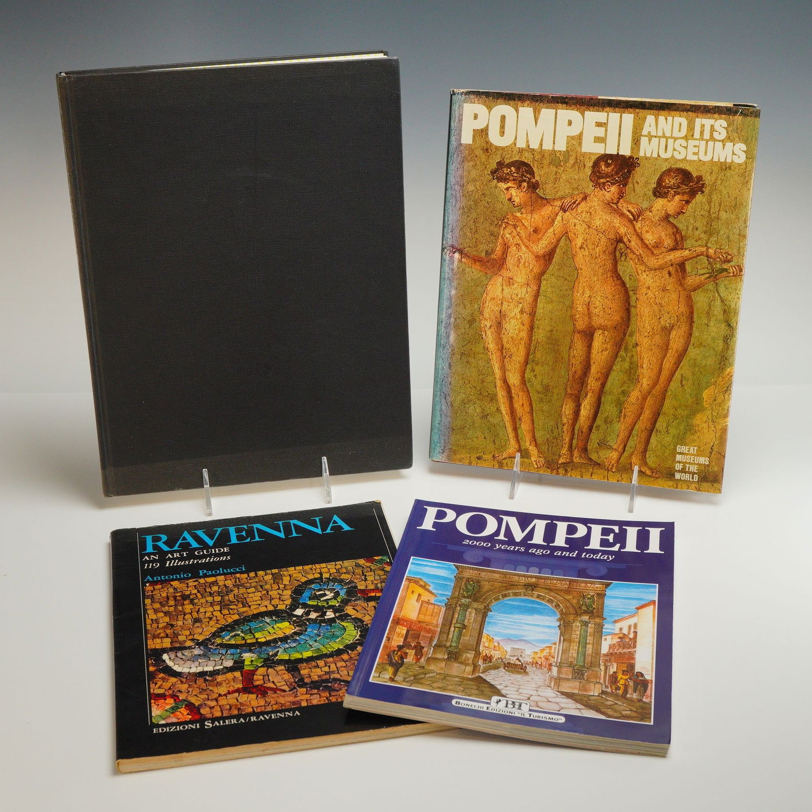 4 Italian Art & Archaeology Books, Ravenna & Pompeii Guides: Collection of four volumes exploring the art, history, and archaeology of Italy, with a focus on Ravenna and Pompeii. This lot includes both paperback and hardcover editions. Includes Ravenna and Art