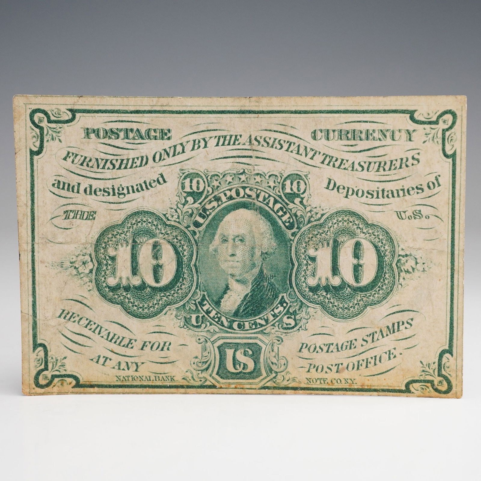 1862 U.S. Postage Currency Ten Cents - First Issue: Currency note for ten cents, part of the First Issue authorized under the Act Approved July 17th, 1862 at the outset of the Civil War coin shortage. The obverse features a green vignette portrait of G
