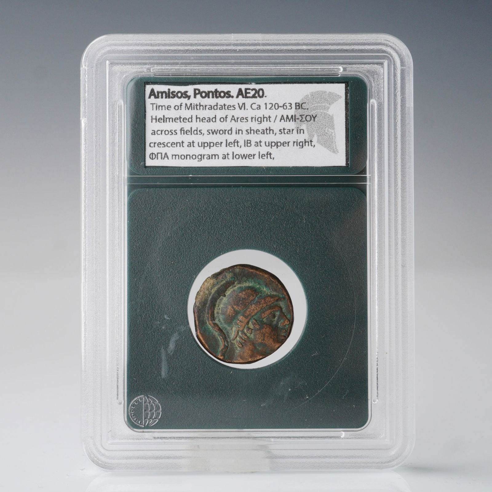 Ancient Amisos, Pontus AE20 Coin Main Street Rare Coins Slabbed: Coin from the time of Mithradates VI, circa 120-63 BC, encapsulated in a Main Street Rare Coins holder. The obverse features a helmeted head of Ares facing right. The reverse shows a sword in sheath