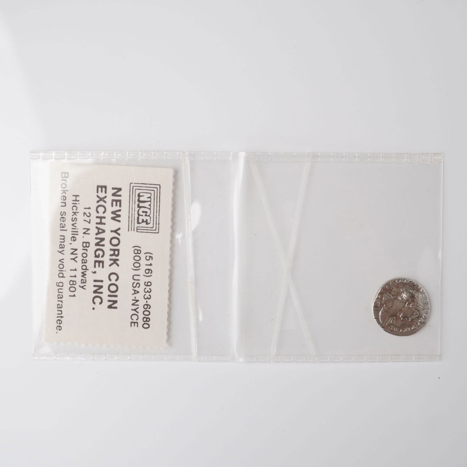 Circa 98 - 117 AD Roman Trajan Coin: Roman coin from the reign of Emperor Trajan, dating from circa 98-117 AD. The obverse features a laureate head of Trajan facing right with slight drapery on the left shoulder, accompanied by an