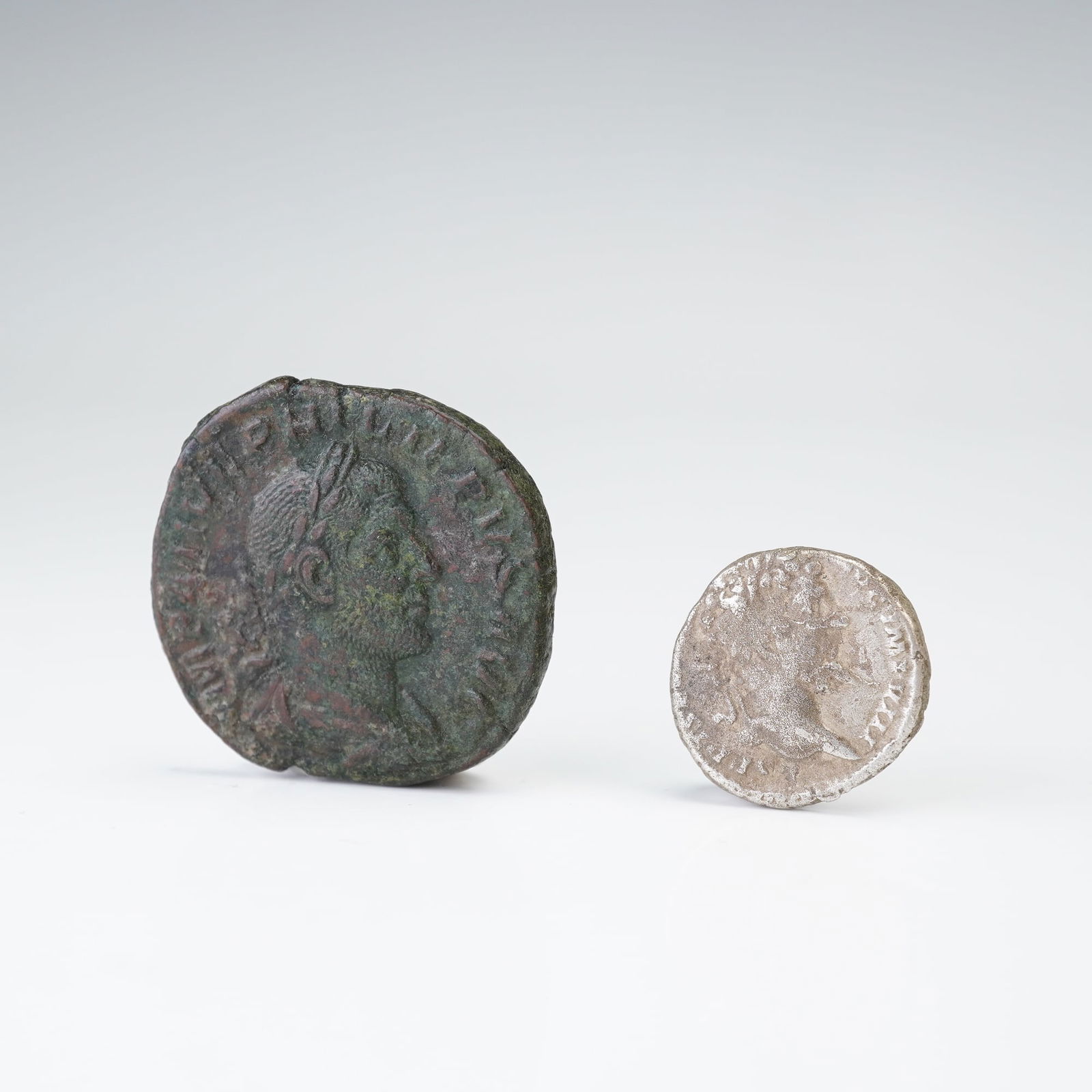 2pc Roman Septimus Servus Silver Denarius & Philip I Bronze Sest Coins (1 of 2)
