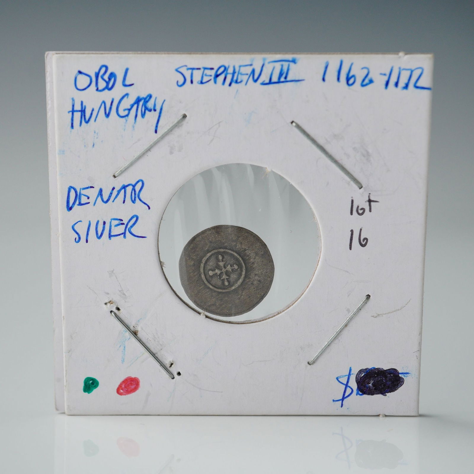 1162 - 1172 Early Medieval Stephen III Denar Coin Hungary: This Early Medieval denar coin dates to the reign of Stephen III of Hungary 1162 1172. The obverse features a central cross surrounded by a detailed border with geometric and decorative symbols. The