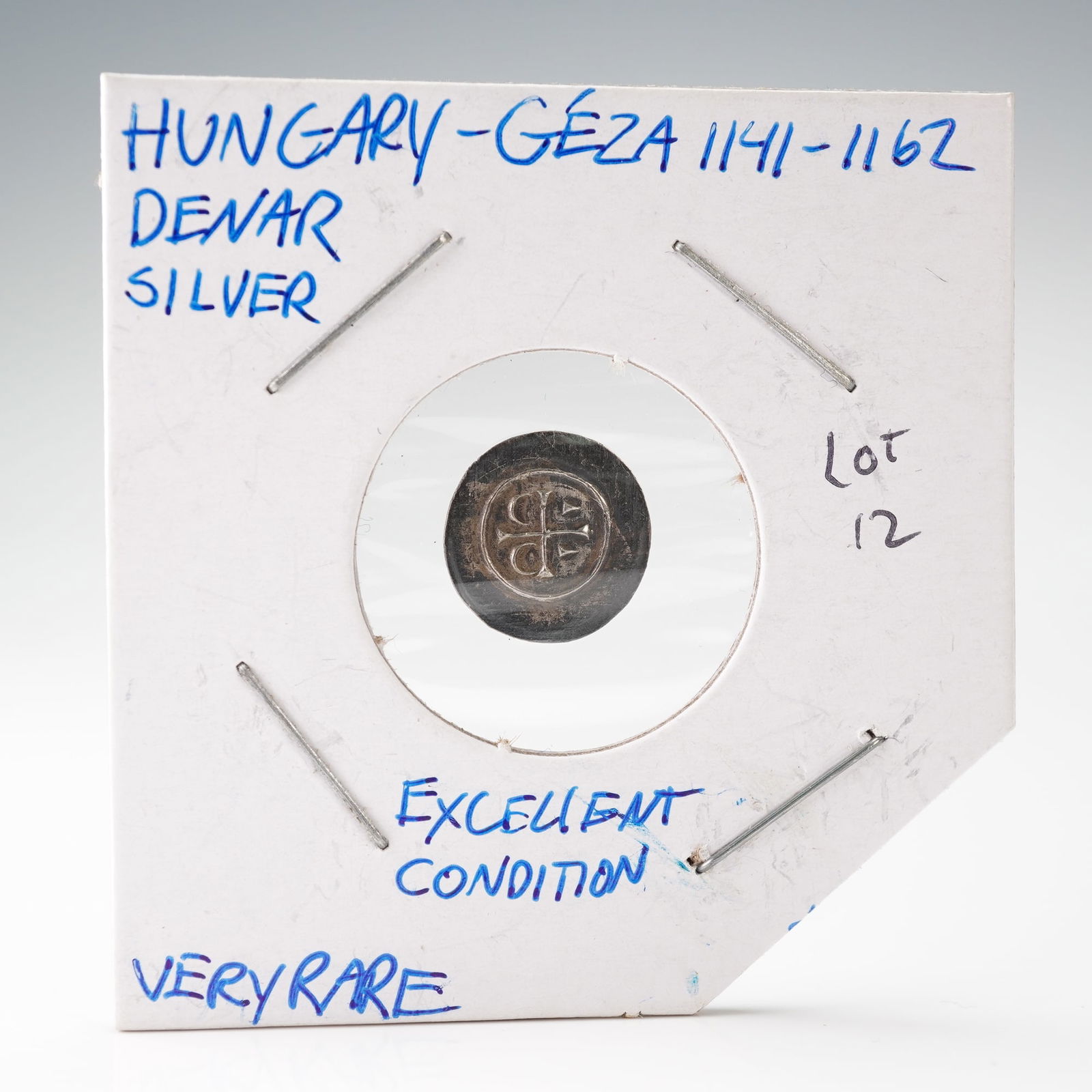 Hungarian King Geza Silver Denar Coin: Struck during the reign of King Geza II of Hungary, this medieval denar features a cross with wedge-shaped ornaments on the obverse and an ornate linear motif surrounded by dots and crosses on the