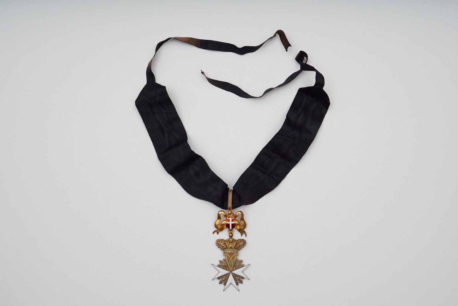 Austrian Order of Malta Neck Badge, Enamel on Bronze by Rothe Wien: A distinguished 19th-century Austrian Order of Malta neck badge, exquisitely crafted in enamel on bronze and presented with its original Rothe Wien fitted case. This exceptional example features the c