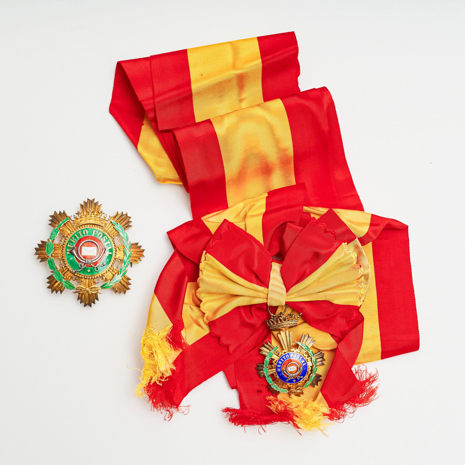 2pc Spanish Civil Order of Postal Merit Badges, Enamel on Bronze: An impressive two-piece set of the Civil Order of Postal Merit (Orden Civil del Merito Postal), established by the Spanish government to recognize exceptional contributions to postal and communication