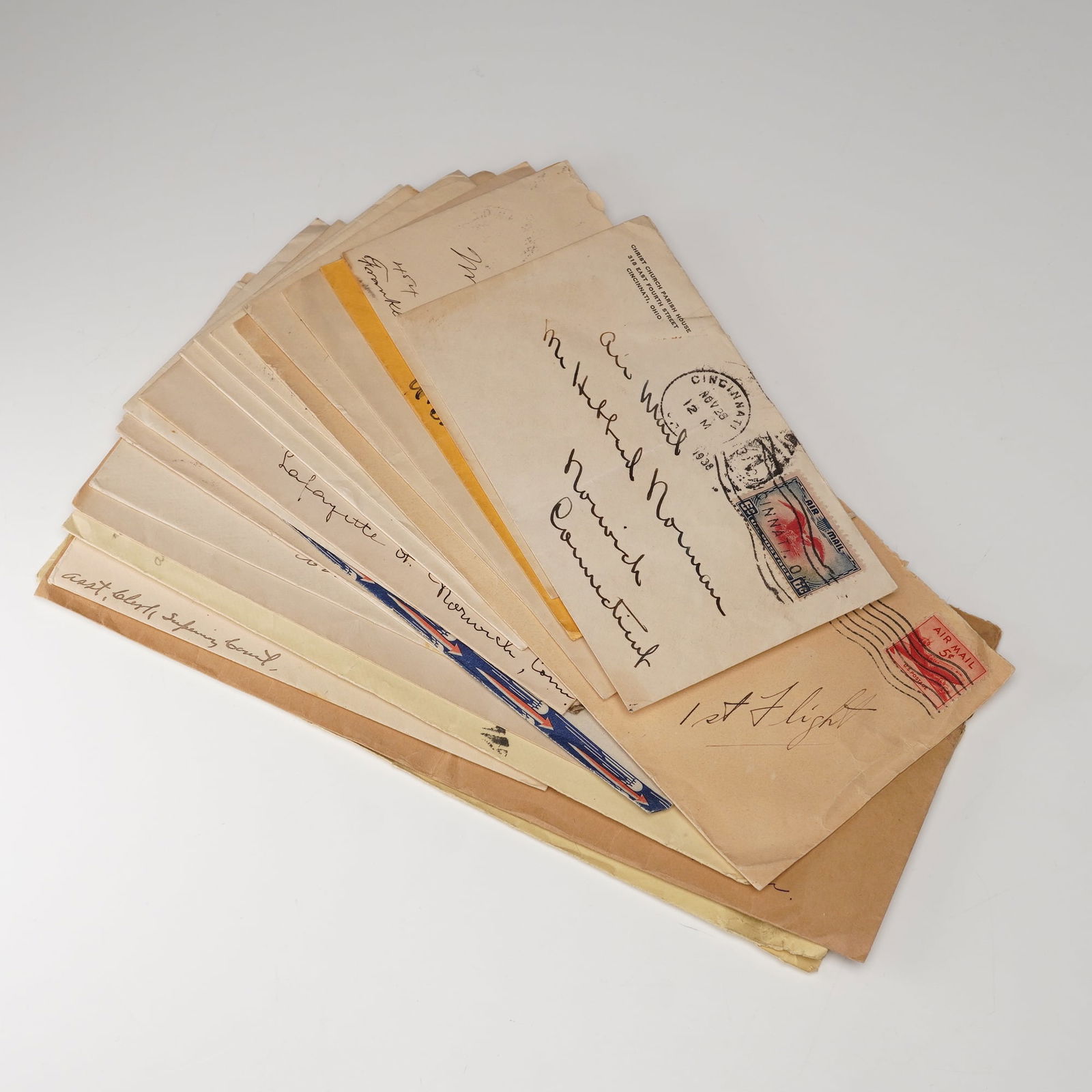 1895 - 1943 Assortment of U.S. Postal Covers and Stamps: This assortment includes U.S. postal covers and stamps dated between 1895 and 1943, featuring postmarks from cities including Brooklyn, San Bernardino, Saint Paul, and Norwich. The group highlights no
