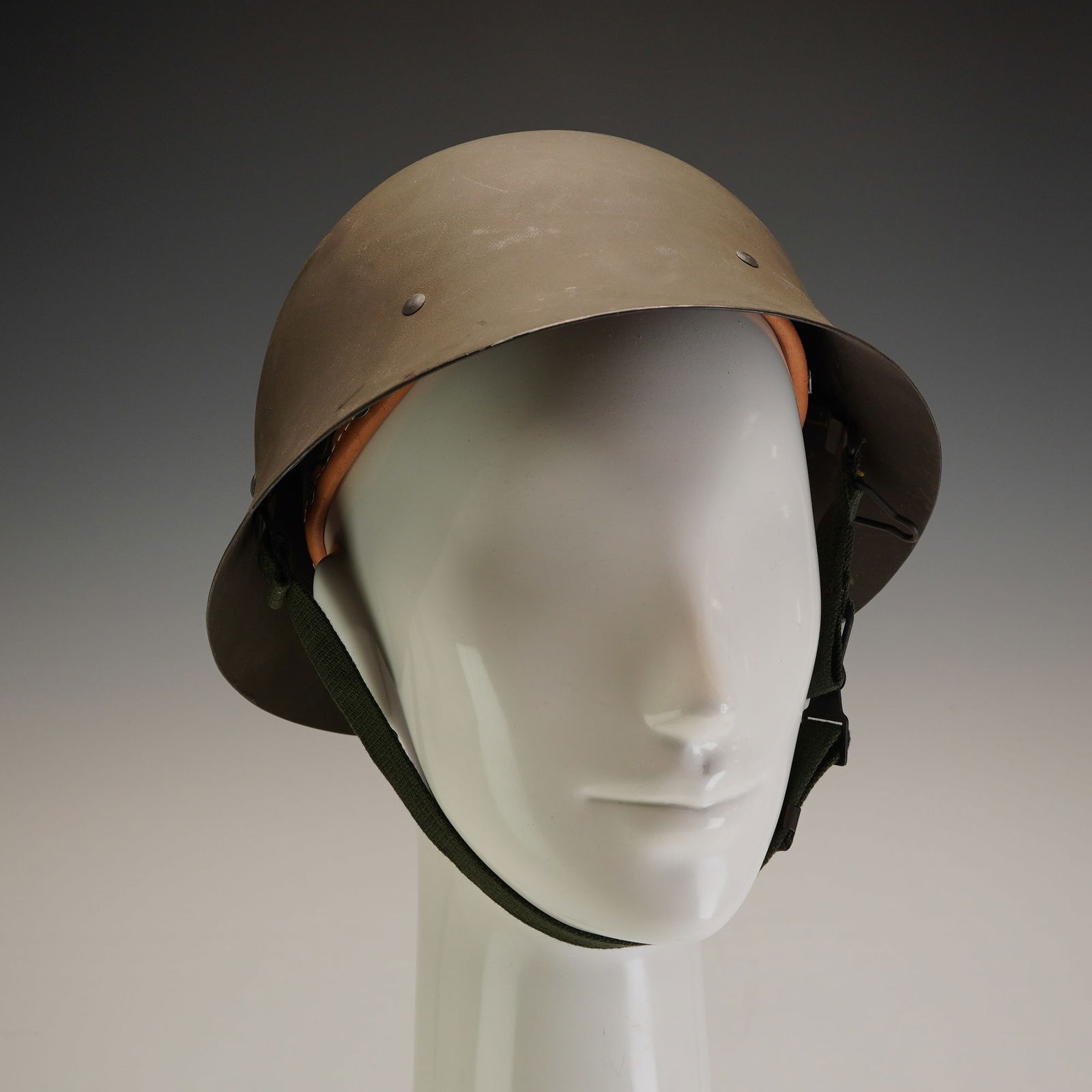 Sweden, Royal Swedish Army, Steel Combat Helmet with Full Liner and Chinstraps, Cold War Era: Sweden, neutral, Royal Swedish Army, steel combat helmet with full liner and chinstraps. This is a Swedish M26 pattern helmet, specifically the modernized M26/56 variant used throughout the Cold War.