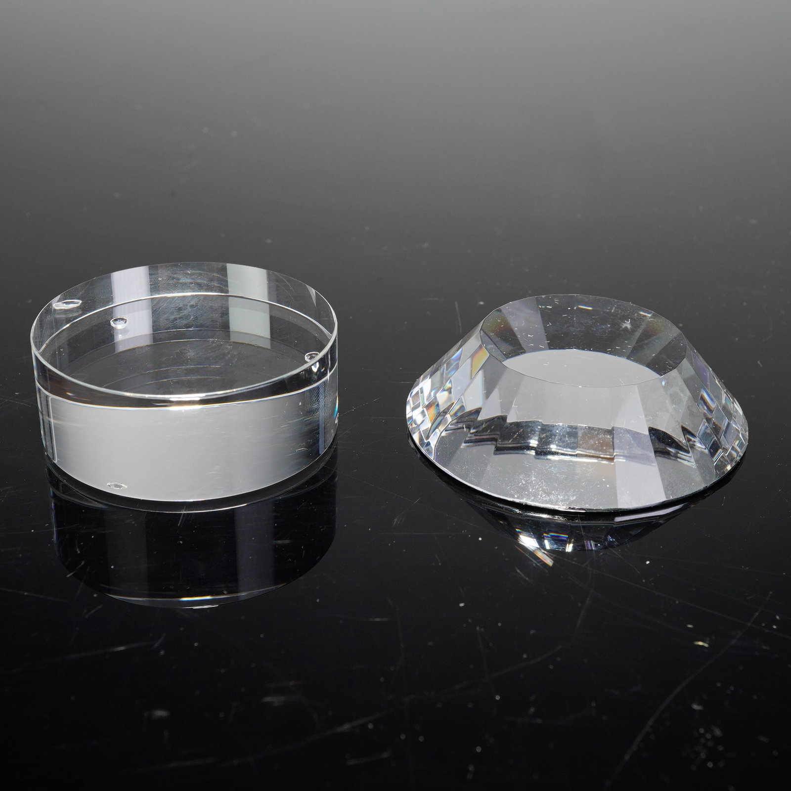 Swarovski for Arribas Bros., The Arribas Collection, Pair of Crystal Display Bases: This lot features a pair of high-quality crystal display bases from The Arribas Collection, confirmed to be 2pc Swarovski Crystal for Arribas Bros. Bases. The set includes two distinct architectural d