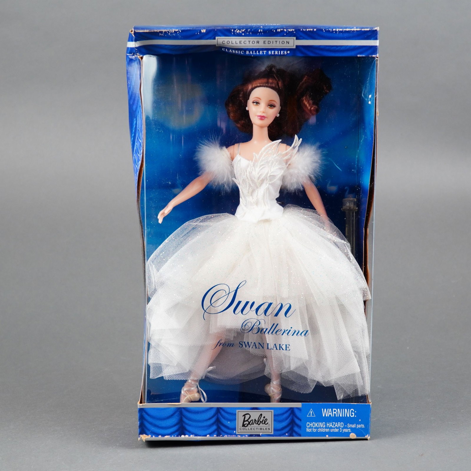 Mattel Swan Ballerina from Swan Lake Barbie Doll, 11.5 Inches: Produced by Mattel as part of the Classic Ballet Series Collector Edition, this 2001 Barbie as Swan Ballerina from Swan Lake (Model 53867) features a vinyl body with a rooted auburn hair updo and fixe
