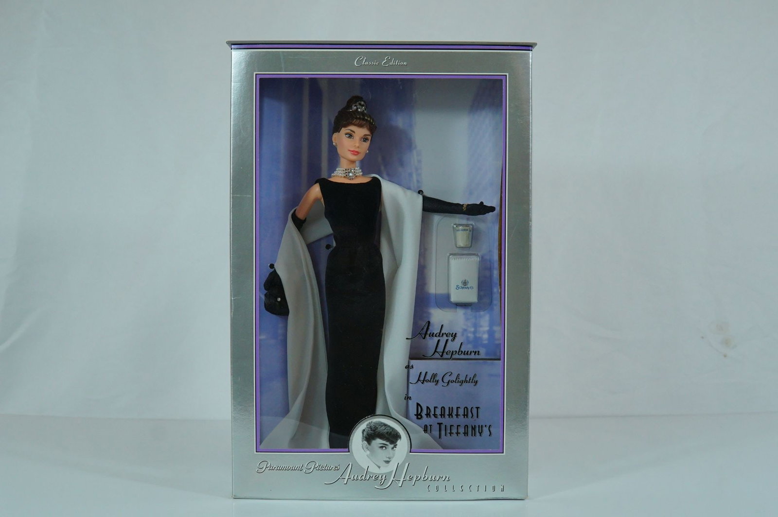 Mattel, Barbie as Audrey Hepburn Breakfast at Tiffany's Doll, 11.5 Inches: Mattel, Inc., vinyl, Paramount Pictures Audrey Hepburn Collection, Classic Edition, 1998, Product Number 20355. This doll features a sculpted head mold of Audrey Hepburn as Holly Golightly with a