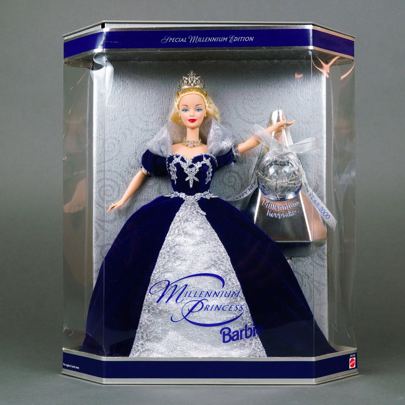Mattel, Millennium Princess Barbie Doll, 11.5 Inches: Manufactured by Mattel, this vinyl collectible doll is the Special Millennium Edition, Item No. 24154, produced to commemorate the year 2000. The doll features a vinyl construction with painted blue