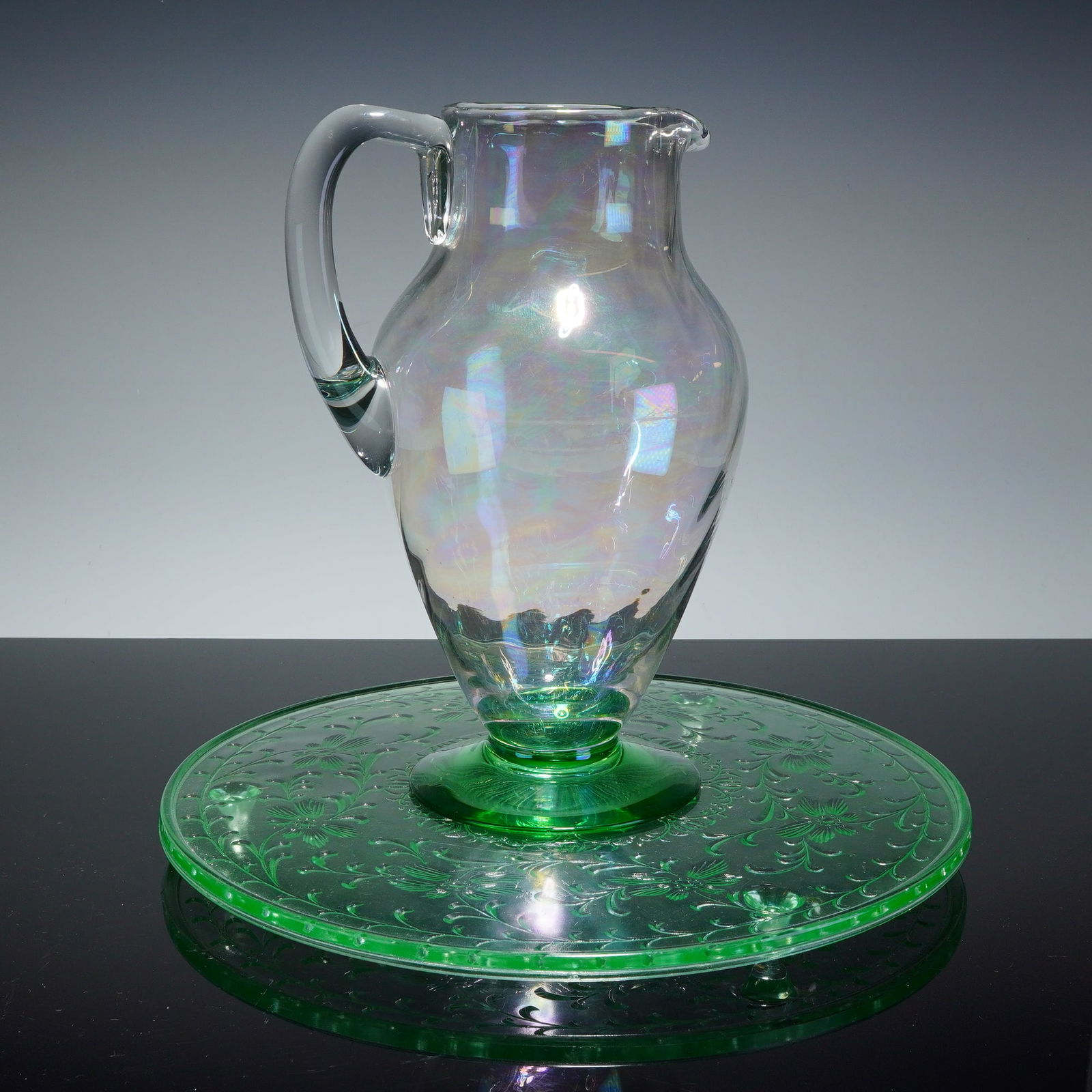 Shaggy Rose Green Uranium Depression Footed Cake Stand with Pitcher: Shaggy Rose Green Uranium Depression Glass Footed Cake Stand, a striking example of 1930s American pressed glass craftsmanship. Featuring the classic Shaggy Rose pattern, this three footed stand