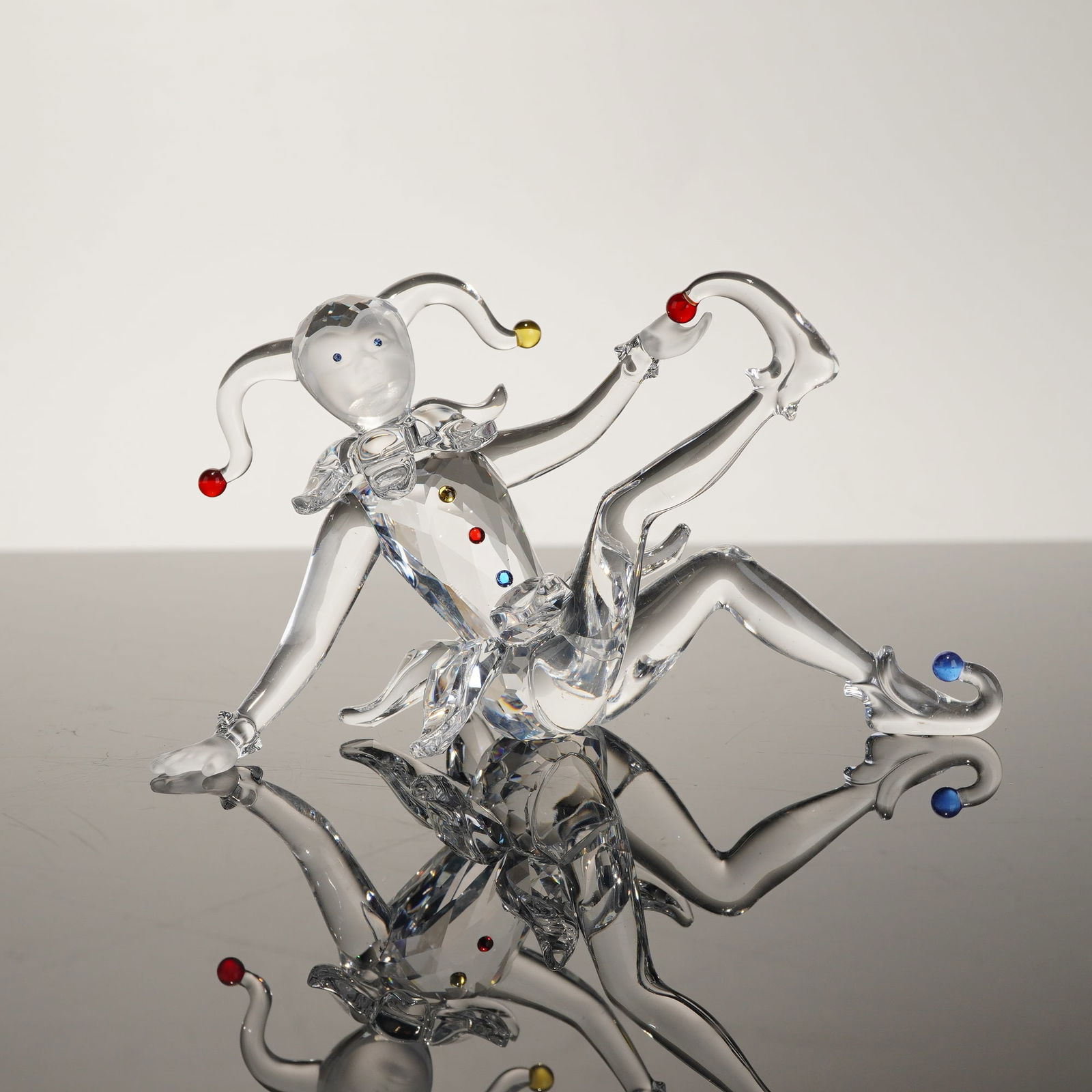 Swarovski SCS Annual Edition 2001 Harlequin Jester: This Swarovski crystal figurine, titled "Harlequin," was the Swarovski Crystal Society (SCS) Annual Edition for 2001 and serves as the second installment in the "Masquerade" trilogy. Designed by Anton