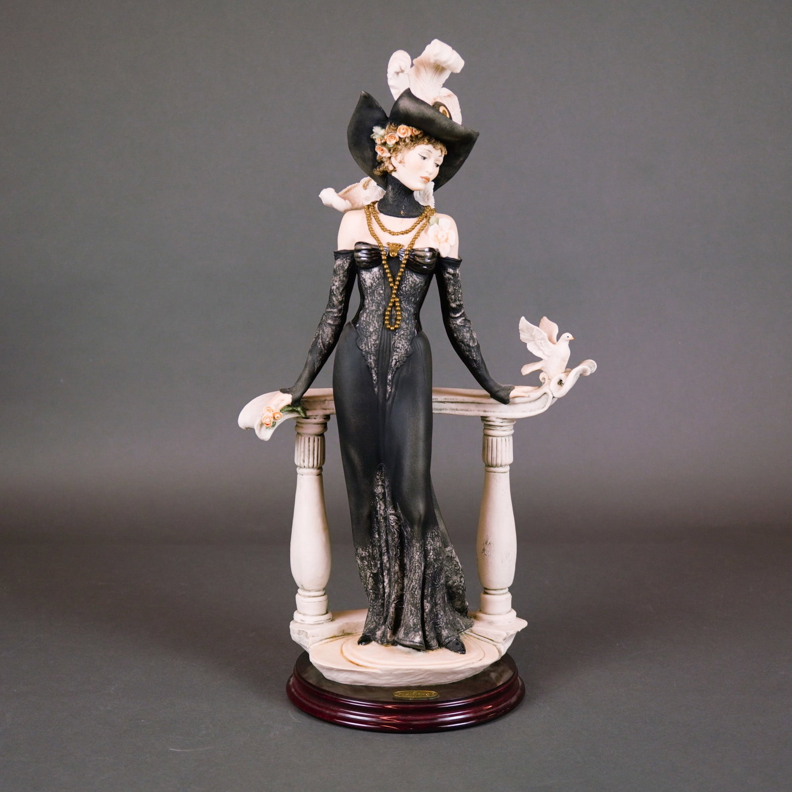 Florence Sculture d'Arte Giuseppe Armani Spring Morning Figurine: This limited edition Giuseppe Armani Florence sculpture model 337C is titled Spring Morning, also known by the Italian title Dama Balaustra con Colomba. The piece features an elegant woman in an Art N