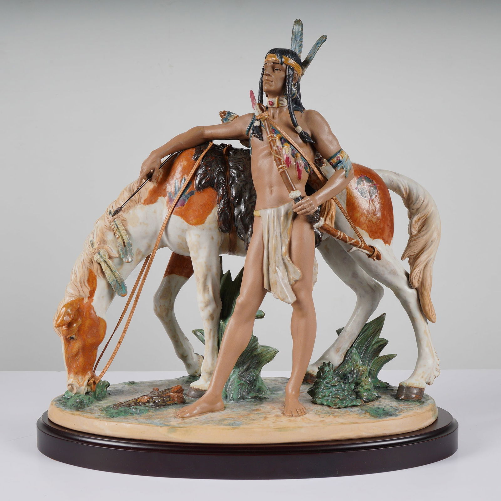 Lladro Indian Brave Limited Edition Figurine Model 1013562: A monumental and finely detailed Gres matte porcelain sculpture from the Lladro American West Collection, titled Indian Brave, model number 1013562. This impressive work depicts a Native American hunt
