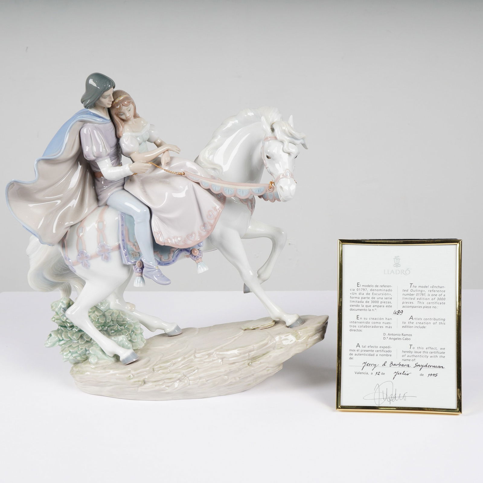 Lladro Porcelain Figurine Love Story #5991: A large and elaborate Lladro porcelain figurine titled Love Story, model number 1005991 (also identified on the accompanying certificate as Enchanted Outing, reference 01797). Sculpted by Jose Puche