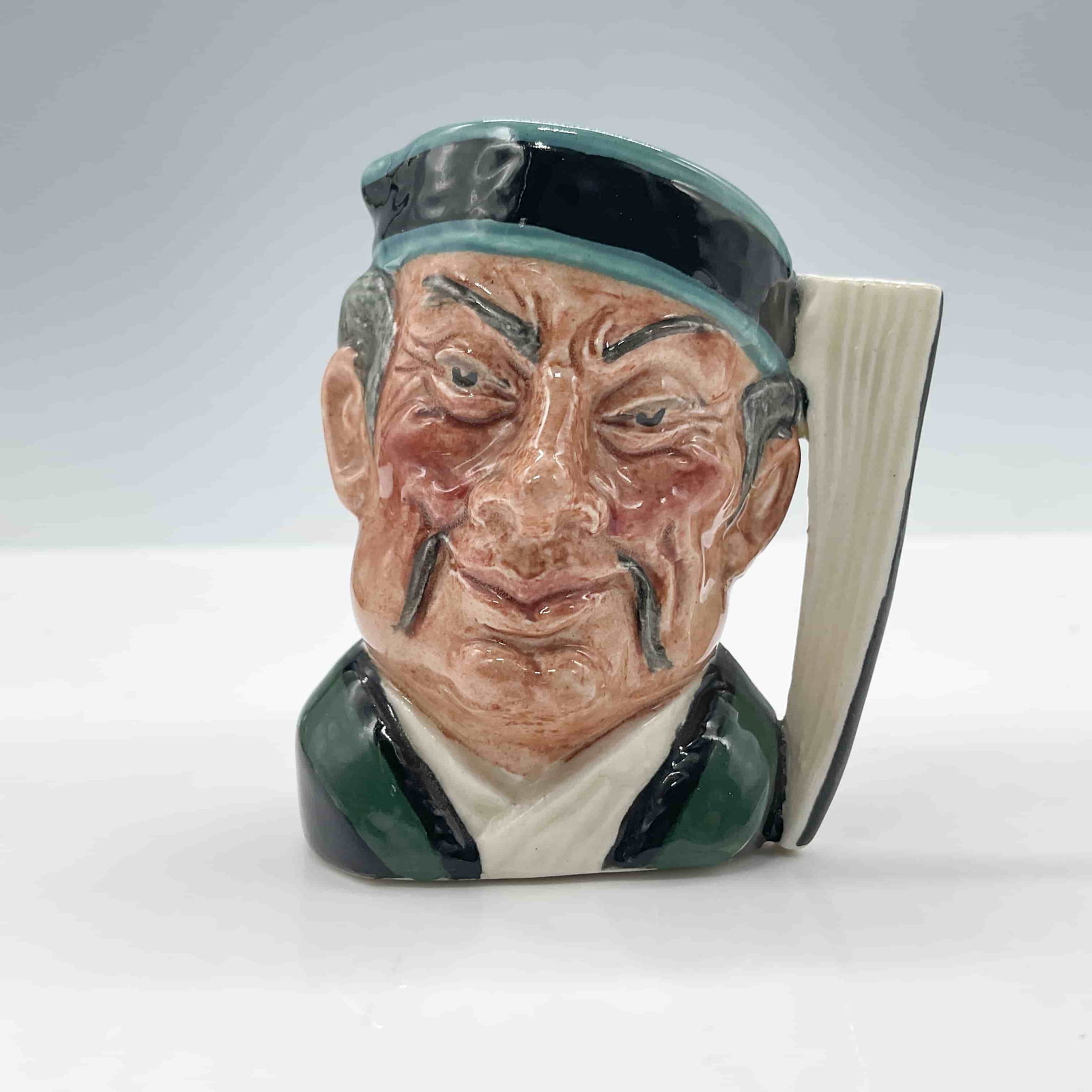 Mikado D6525 - Mini - Royal Doulton Character Jug: Royal Doulton backstamp. ArtistMax Henk Dimensions2.5"H Date or Era1960 - 1969 Manufacturer or BrandRoyal Doulton Country of OriginEngland