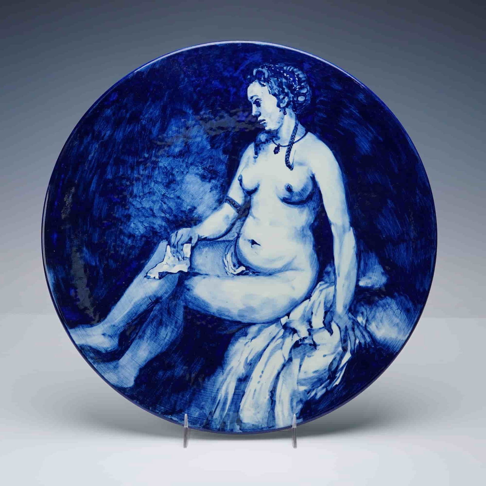 After Rembrandt Delft Hand Painted Decorative Porcelain Plate: This Delft hand painted porcelain decorative plate features a detailed blue and white scene rendered after Rembrandt, executed in rich cobalt tones with expressive brushwork. The reverse is marked DP