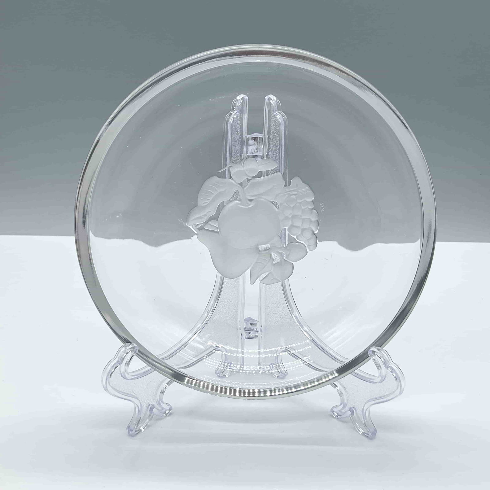 Val St Lambert Crystal Dessert Plate, Brussels: High quality clear crystal. Presents a fruit inspired design in frosted crystal. Marked VSL. Dimensions1.25''H x 6''dia Date or Era20th century Manufacturer or BrandVal St. Lambert Country of